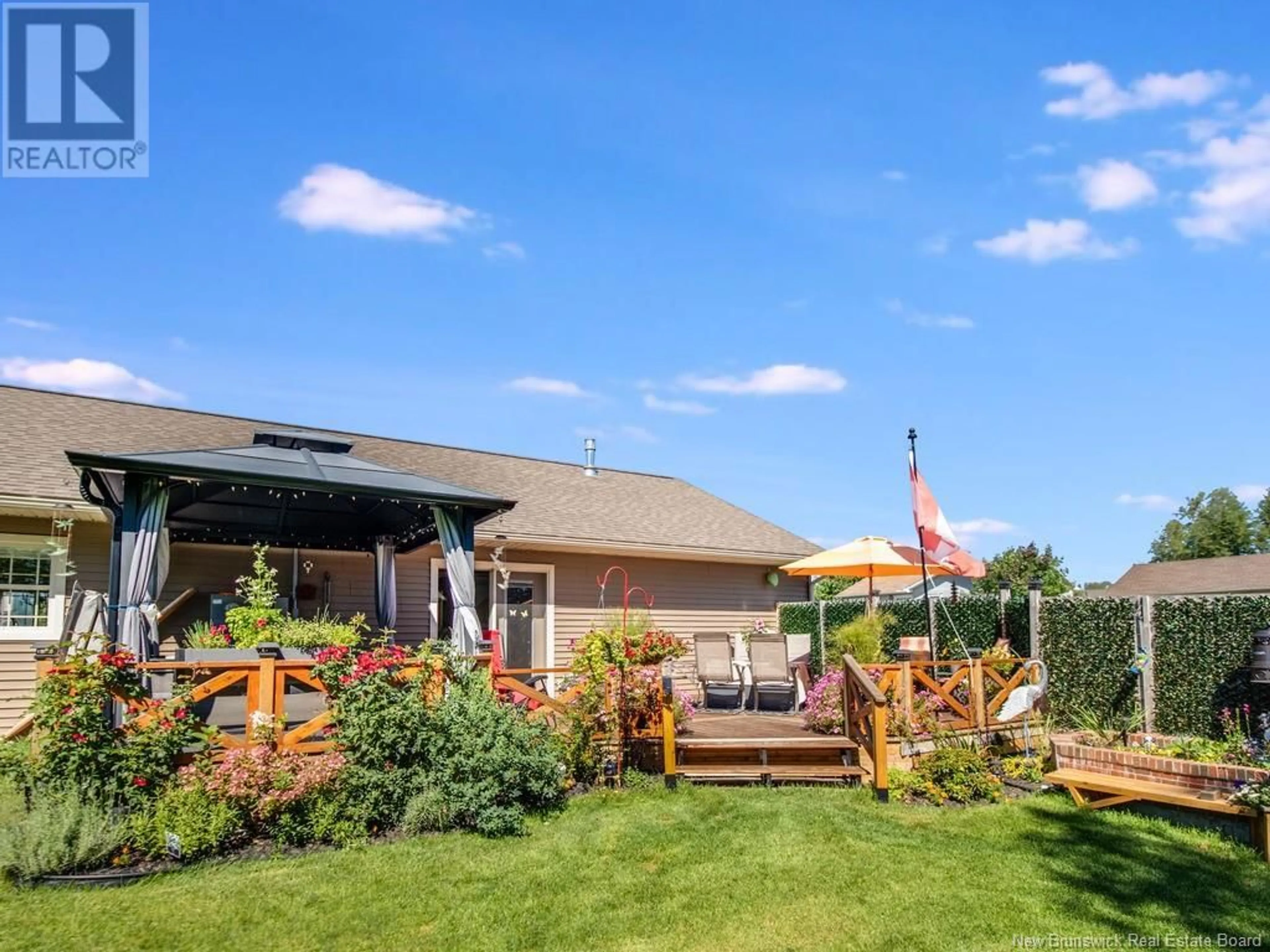 Patio, the fenced backyard for 3 Campbell Court, Oromocto New Brunswick E2V0L7