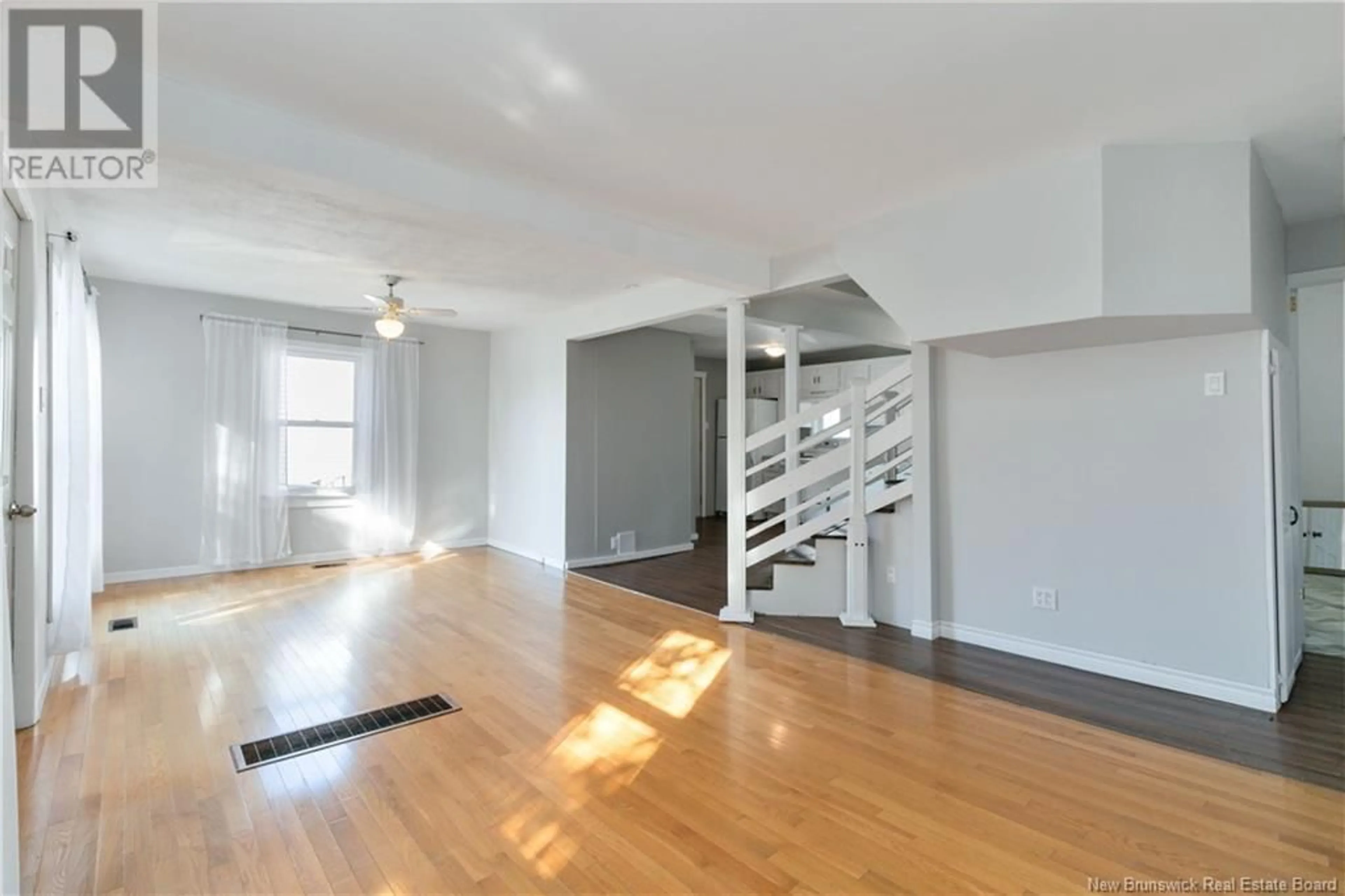 A pic of a room, wood floors for 179 Orleans Street, Dieppe New Brunswick E1A1W8