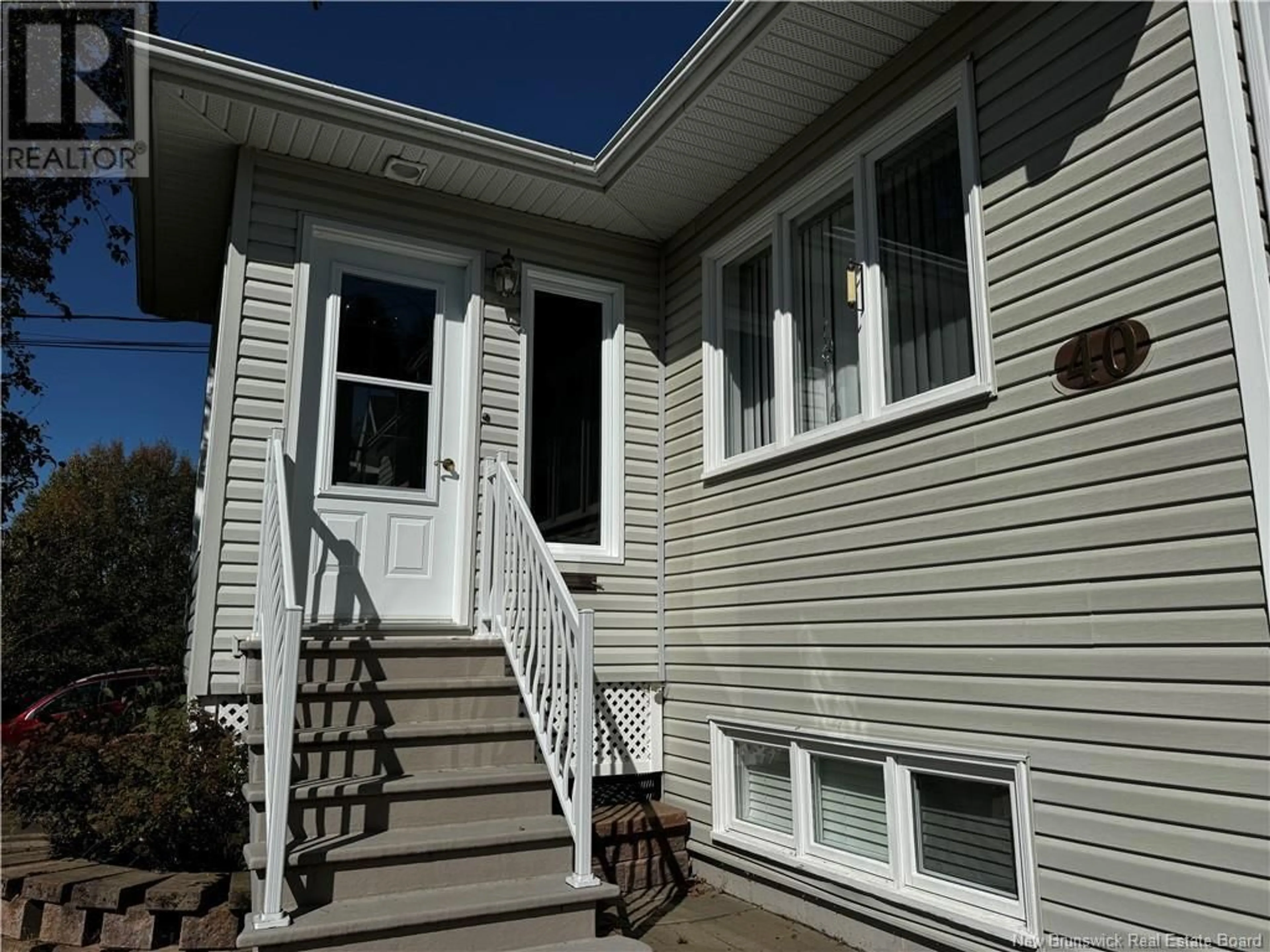 Home with vinyl exterior material for 40 DES GOUVERNEURS Street, Edmundston New Brunswick E3V4H5