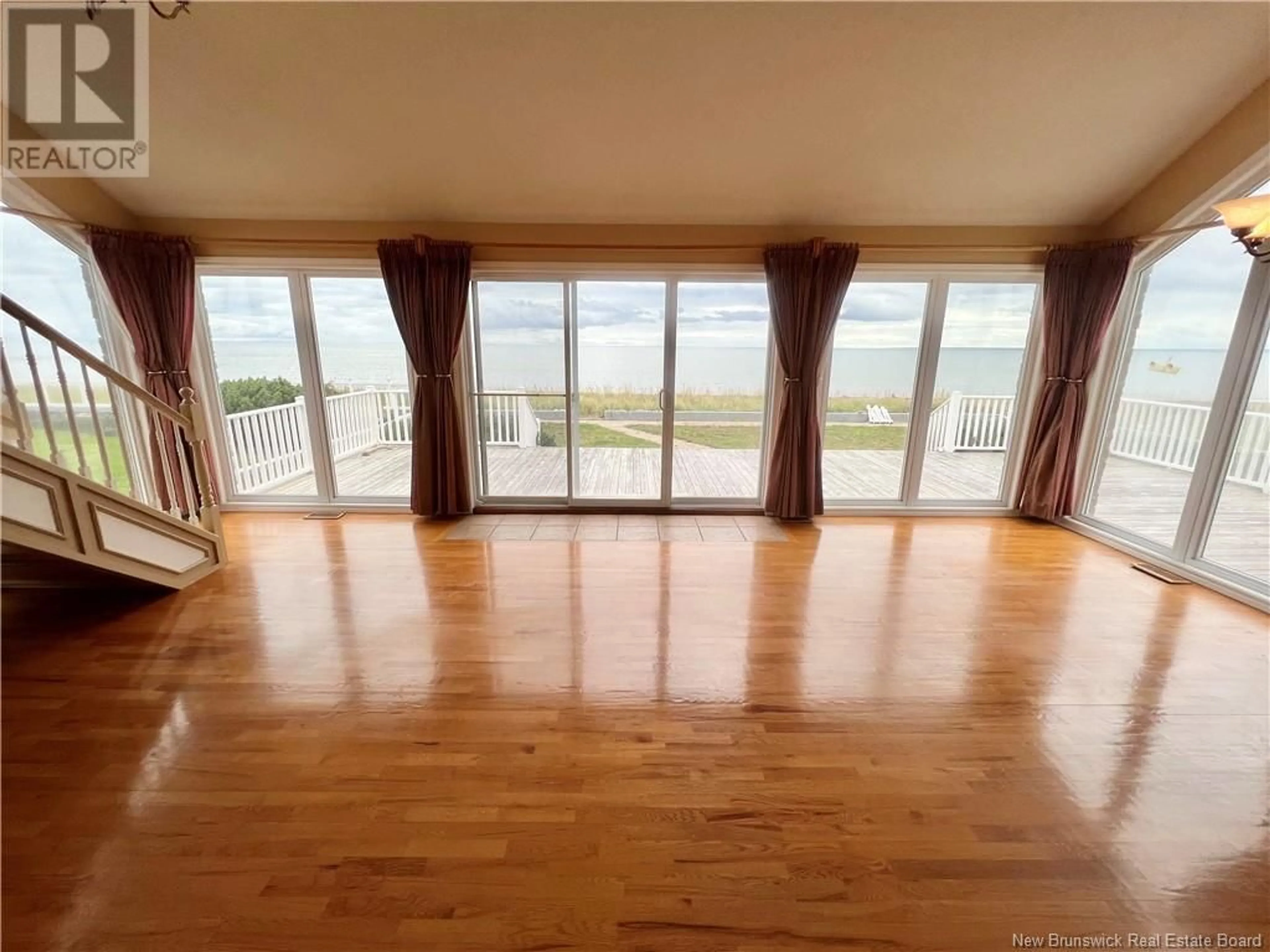 A pic of a room, wood floors for 1057 Jacques Cartier, Beresford New Brunswick E8K1A7