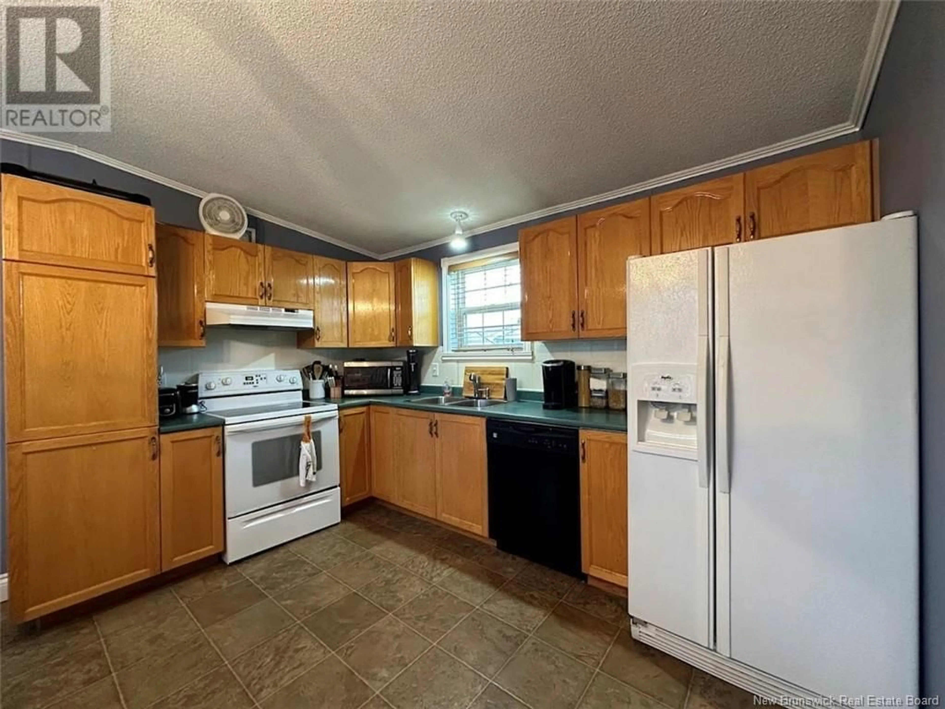 Standard kitchen, wood floors, cottage for 14 Du Bouleau Street, Saint-Jacques New Brunswick E7B1R8