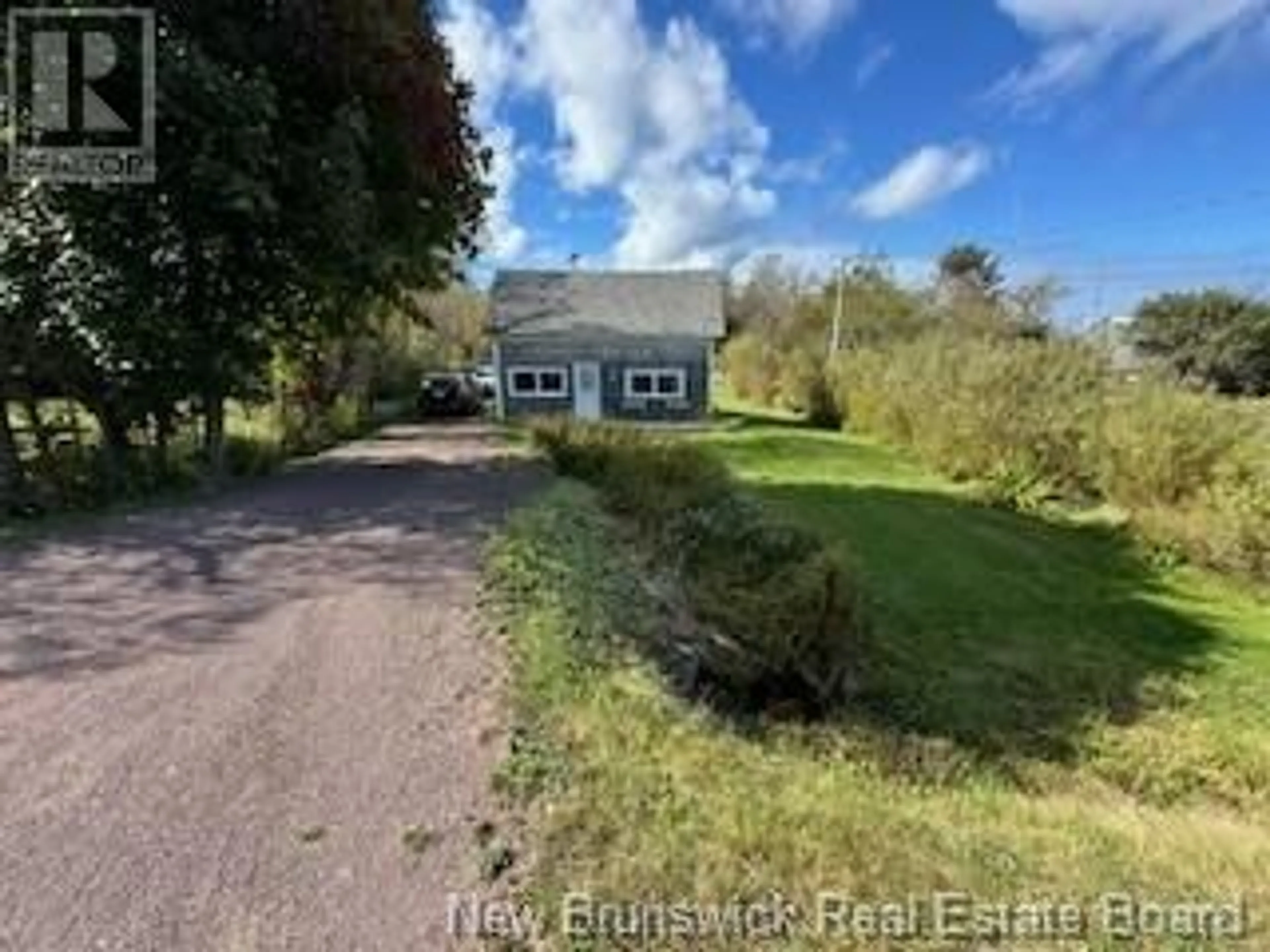 Frontside or backside of a home, the fenced backyard for 910 776 Route, Grand Manan New Brunswick E5G2E4