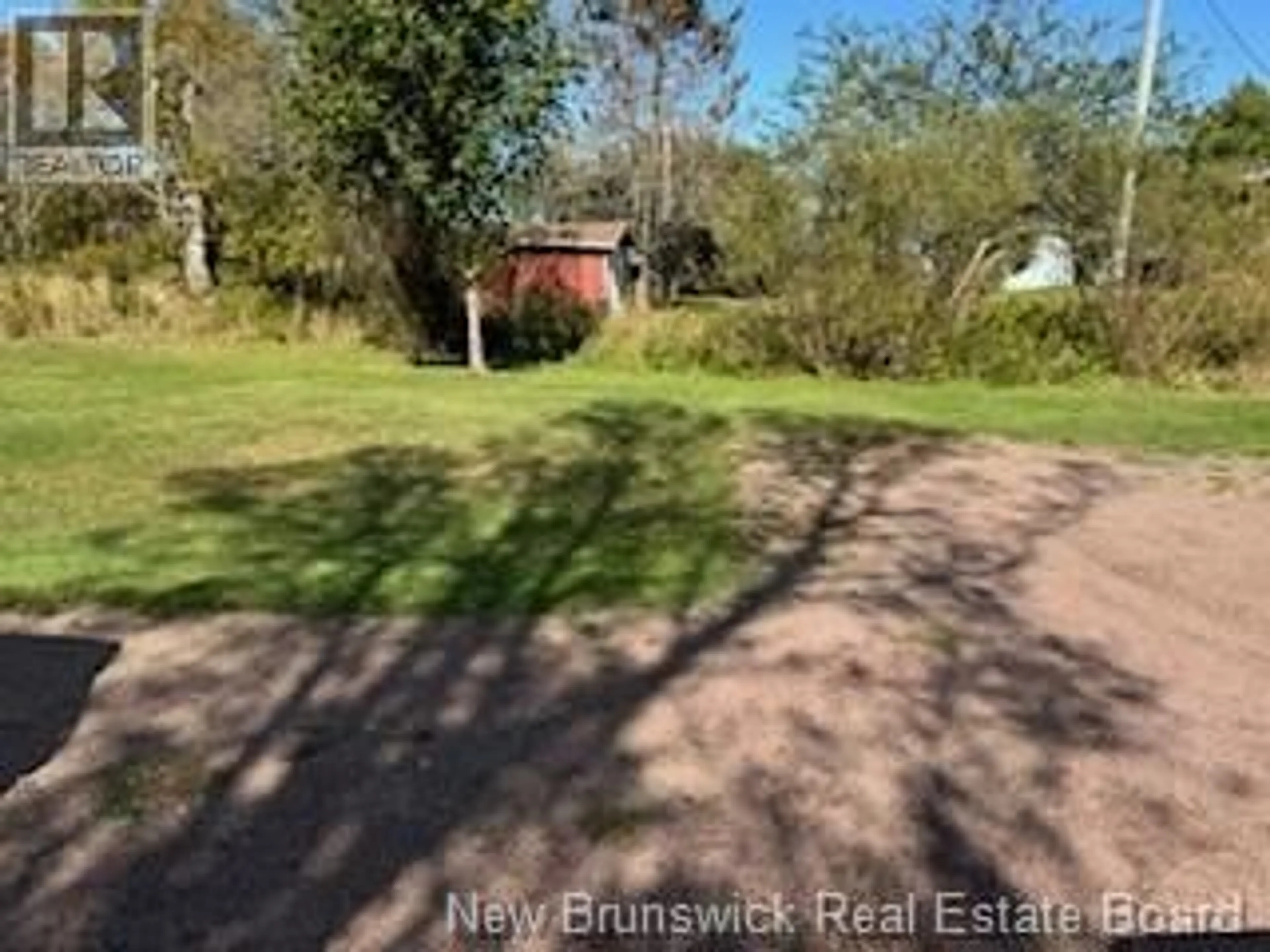 Frontside or backside of a home, the fenced backyard for 910 776 Route, Grand Manan New Brunswick E5G2E4