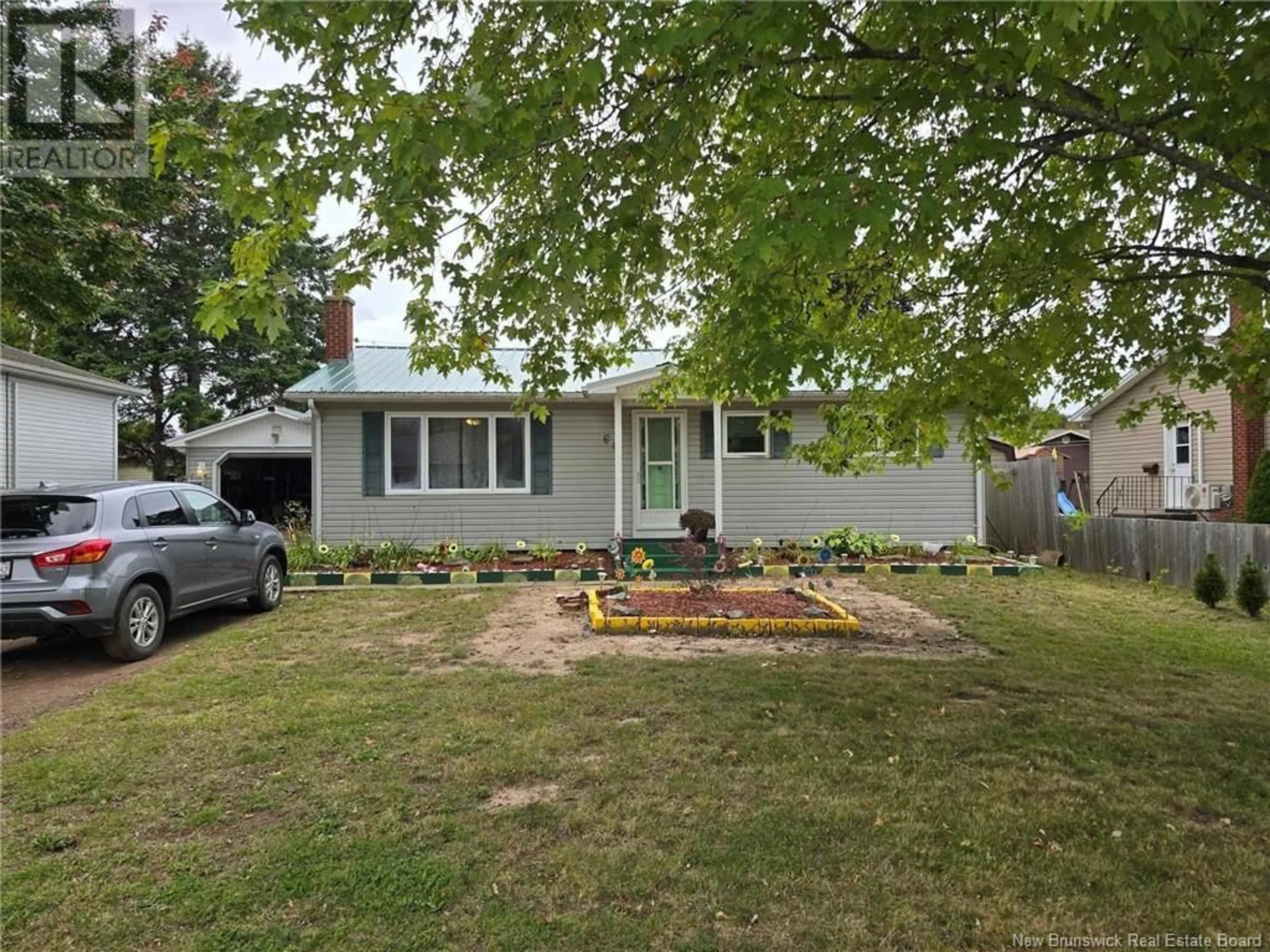 Frontside or backside of a home, the street view for 68 Royal Road, Moncton New Brunswick E1A4S9