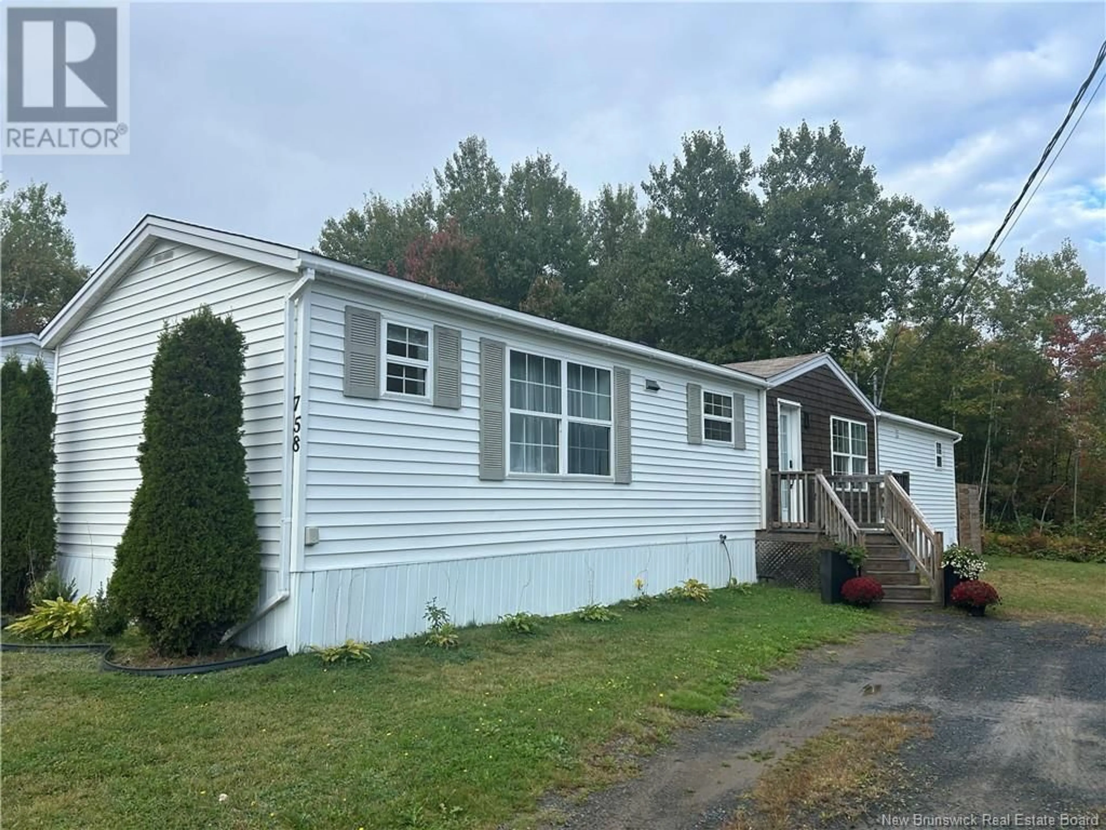 Frontside or backside of a home, the front or back of building for 758 Williston Drive, Miramichi New Brunswick E1V5X9