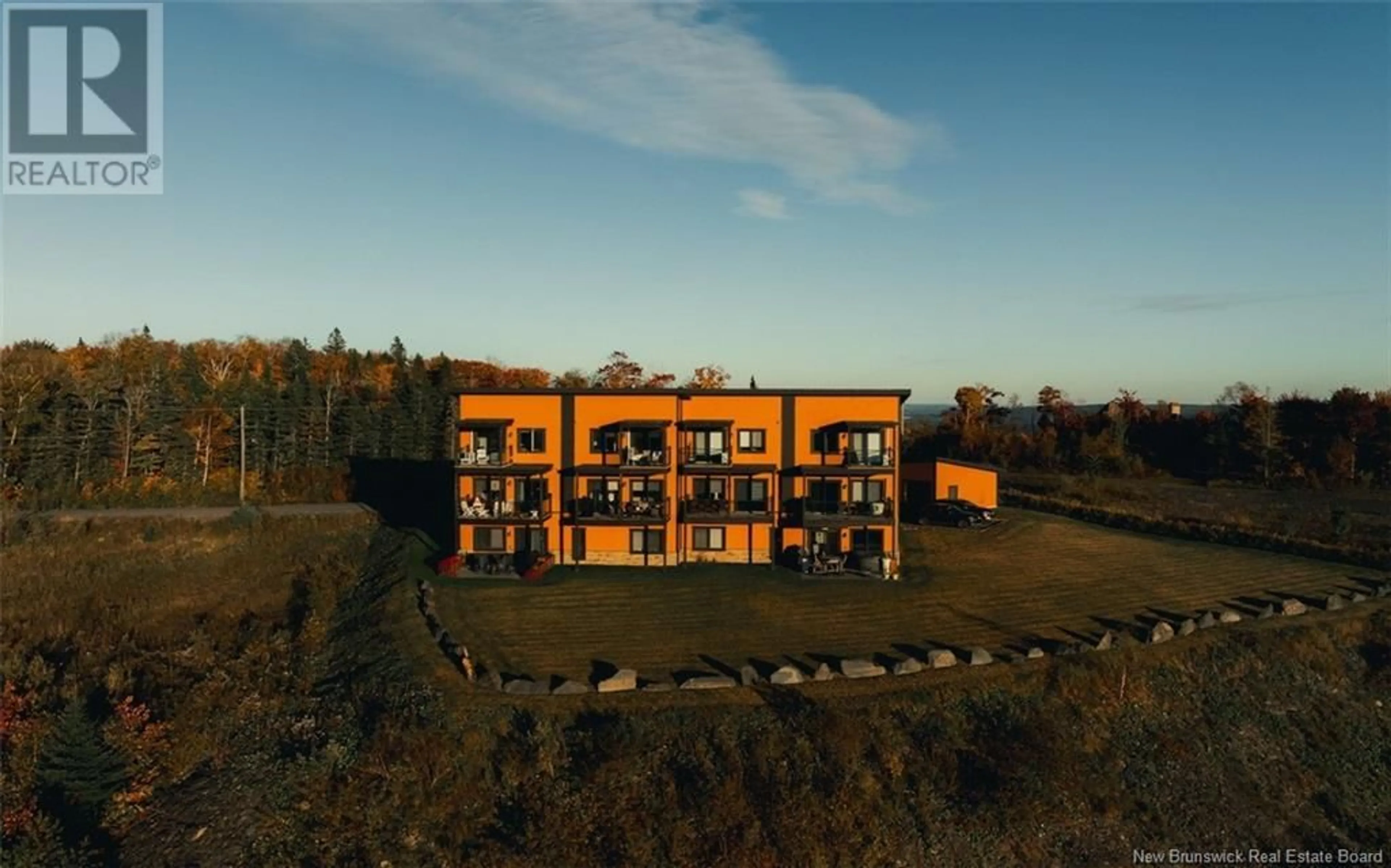 A pic from outside/outdoor area/front of a property/back of a property/a pic from drone, building for 203 - 112 DE LA FALAISE STREET, Edmundston New Brunswick E3V0C4