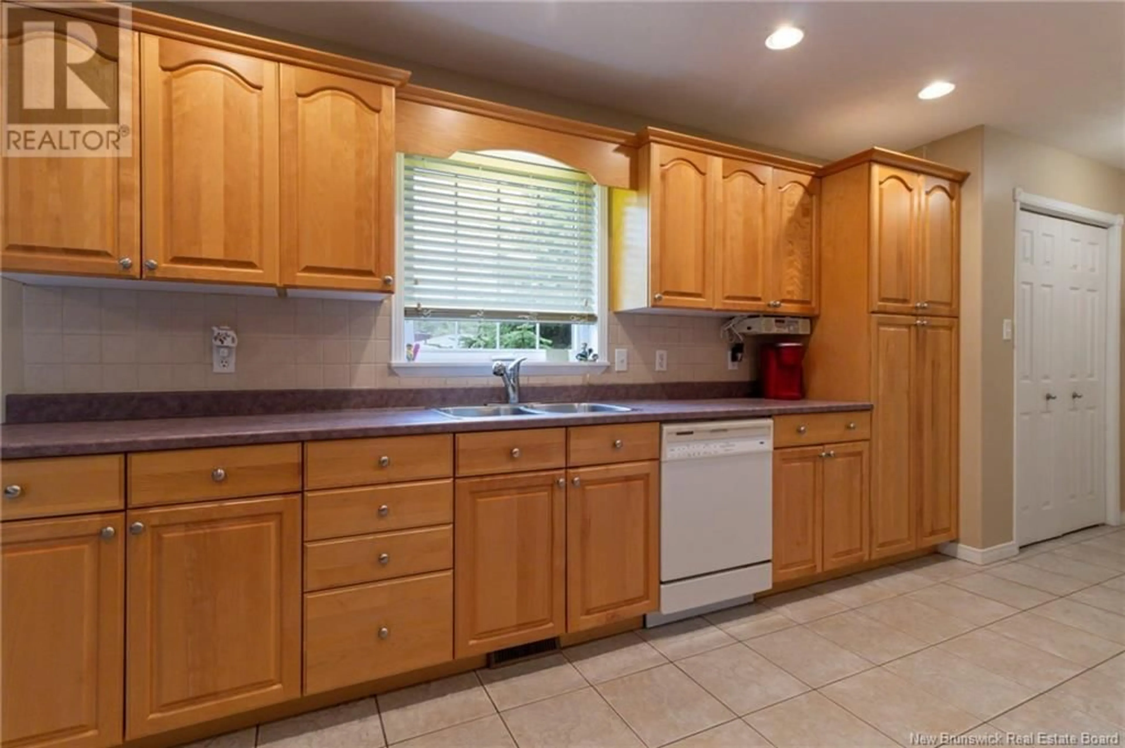 Standard kitchen, wood floors for 35 Dundas Avenue, Champ Dore New Brunswick E4V1N7