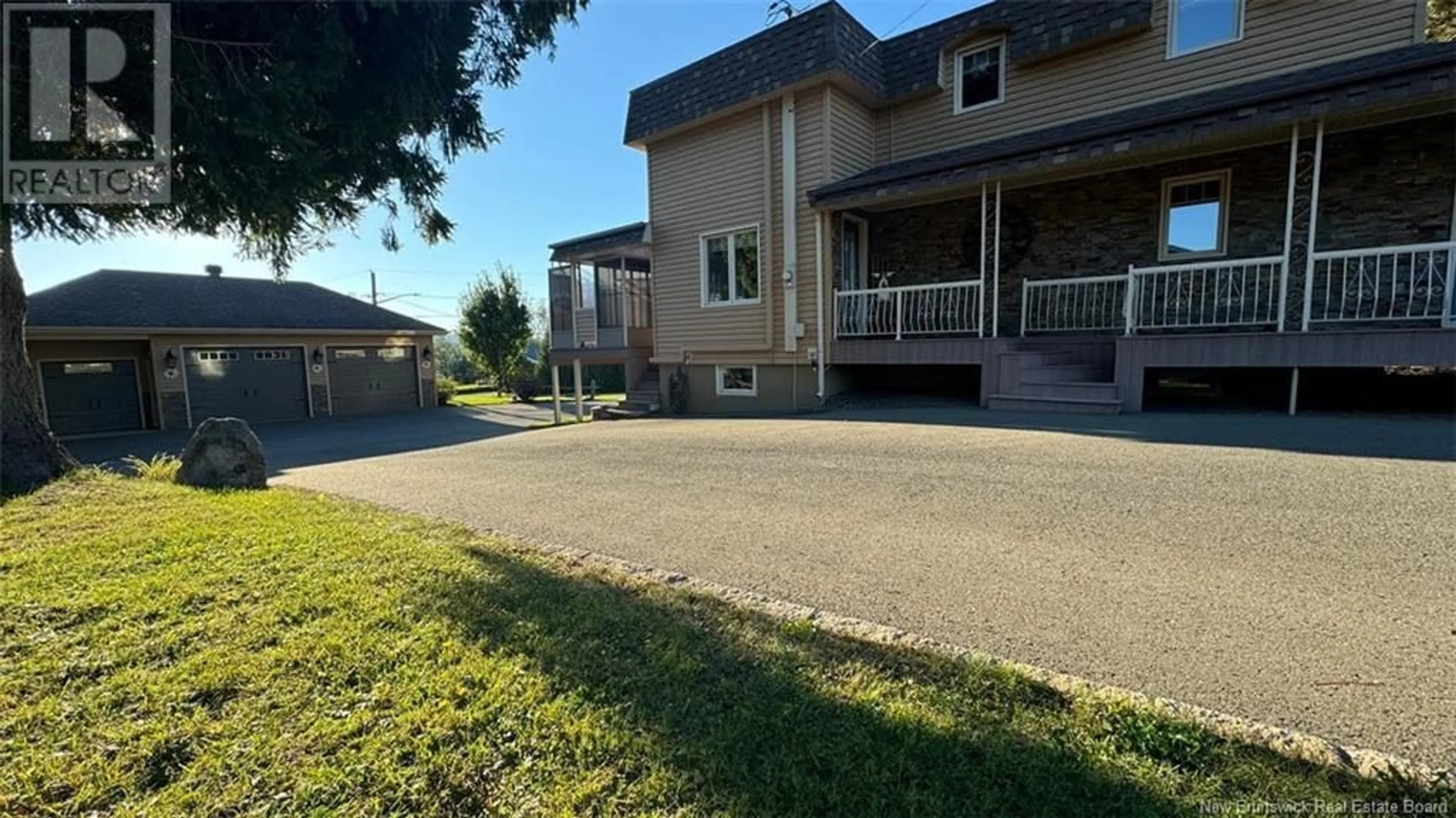 Frontside or backside of a home, the fenced backyard for 98 Principal, Green River New Brunswick E7C2T8