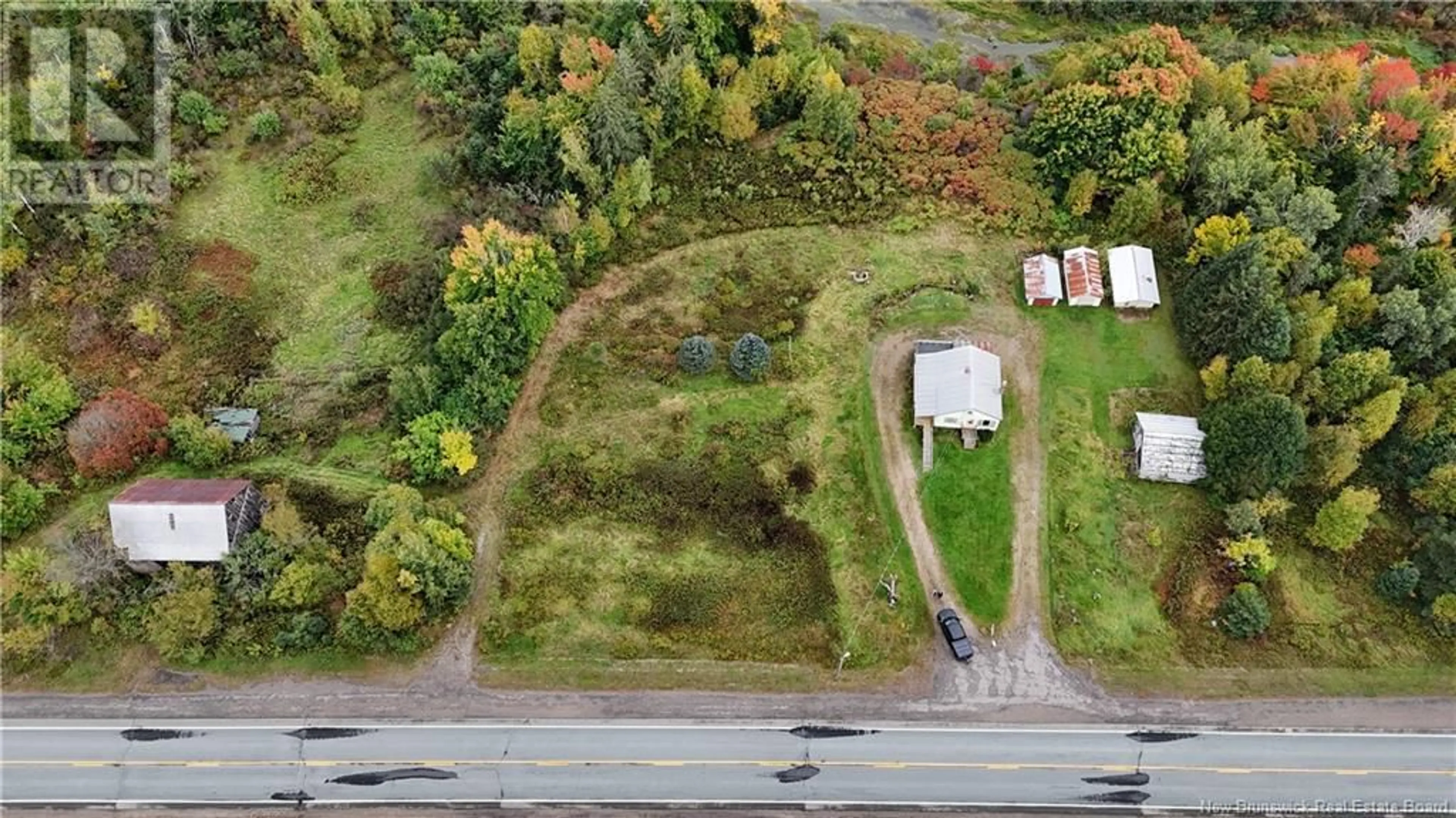 A pic from exterior of the house or condo, the street view for 9994 Route 8 Street, Blissfield New Brunswick E9C1M2