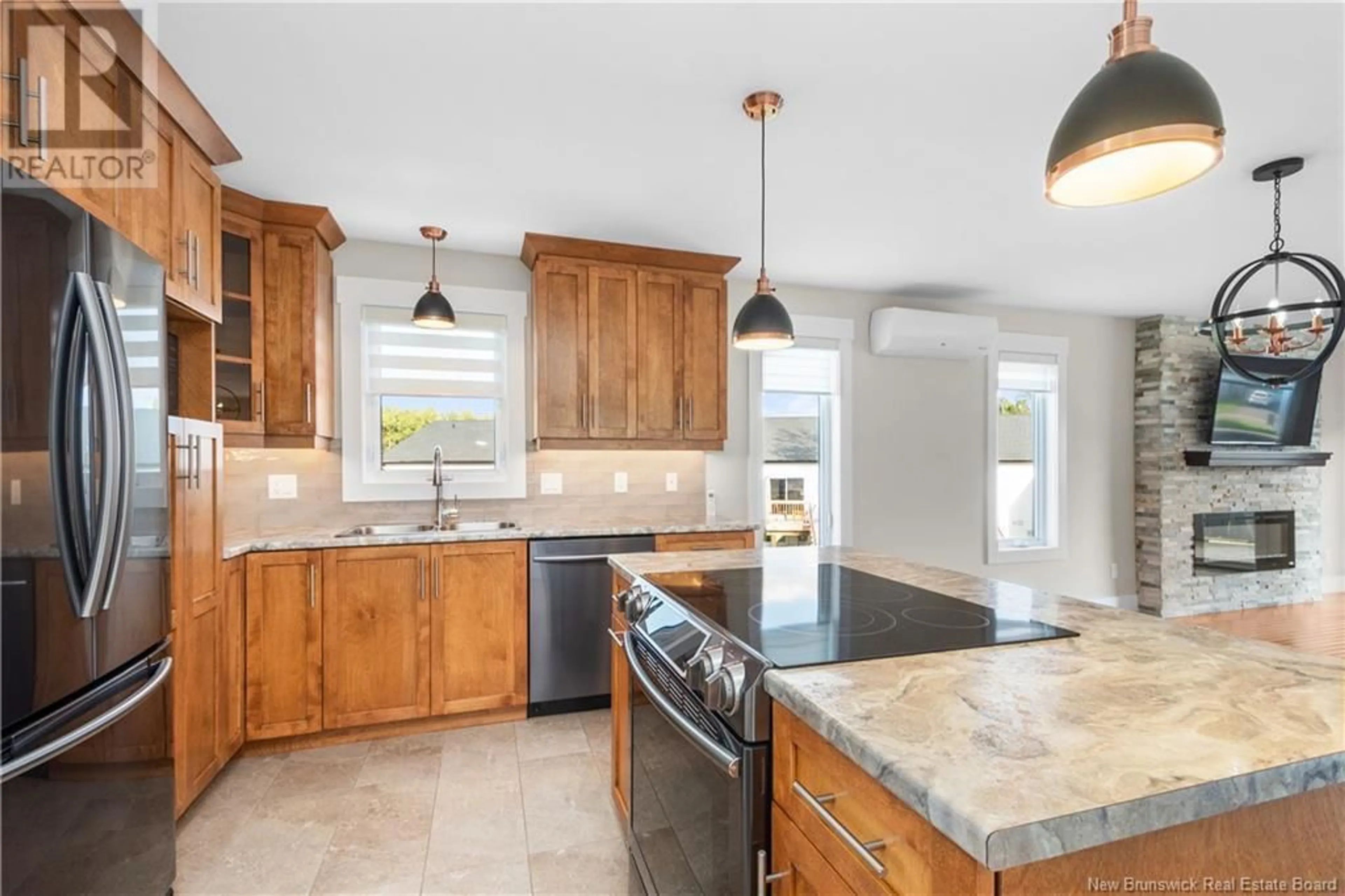 Open concept kitchen for 26 Aime Street, Dieppe New Brunswick E1A9M3