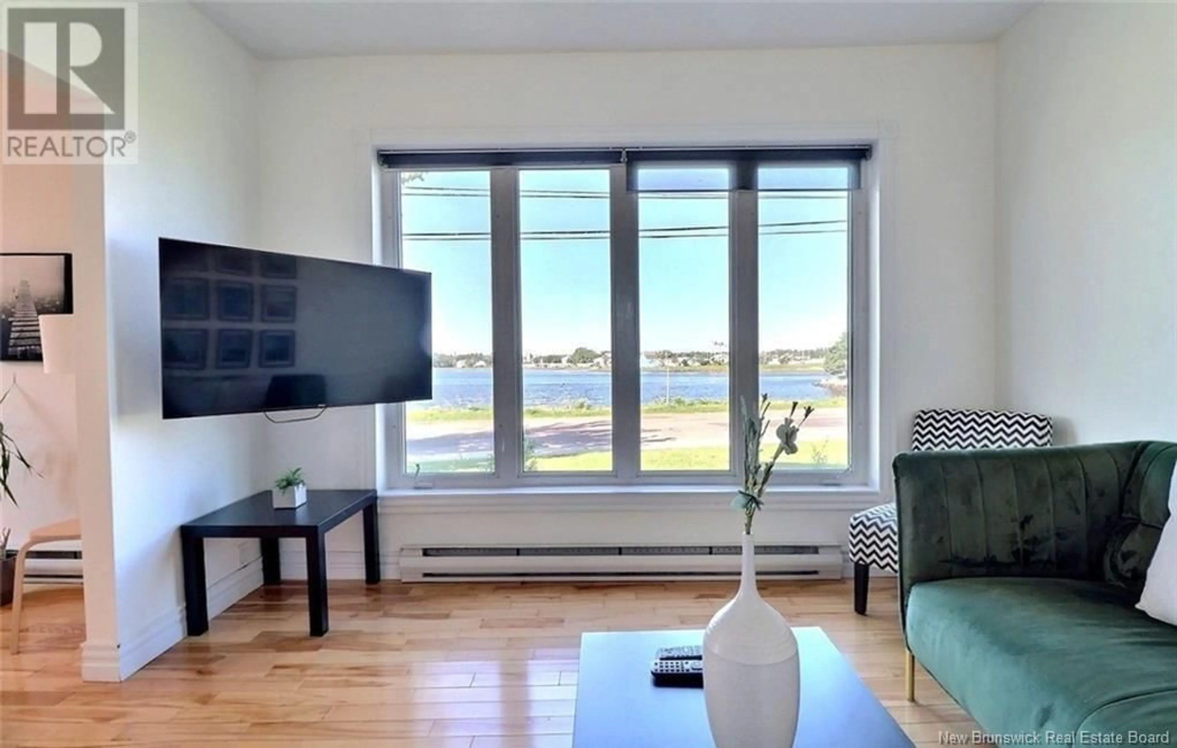 Living room with furniture, unknown for 34 RIVERSIDE DRIVE, Shediac New Brunswick E4P2P2