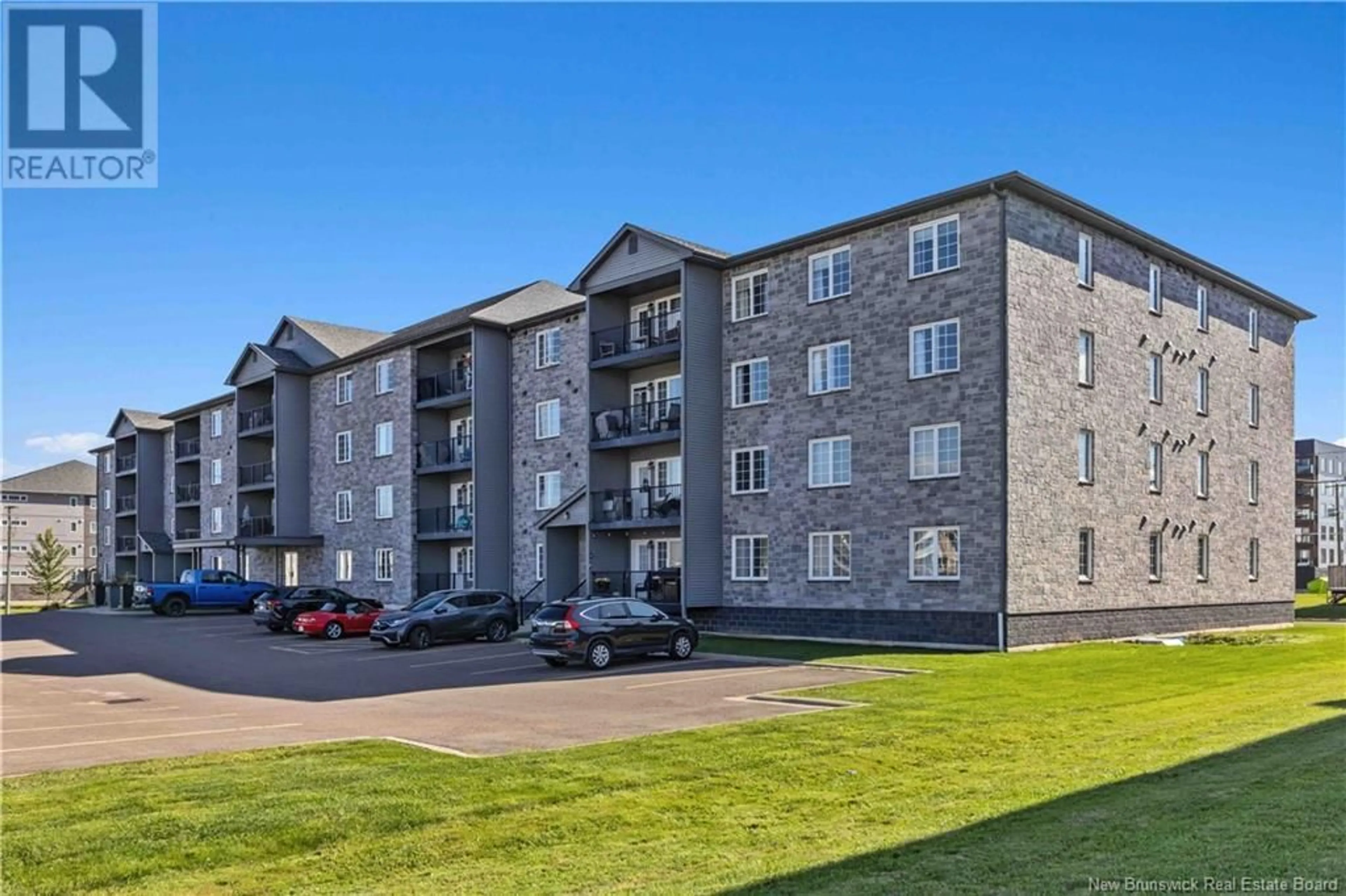 A pic from exterior of the house or condo, the front or back of building for 155 Lian Street Unit# 102, Fredericton New Brunswick E3C0L9