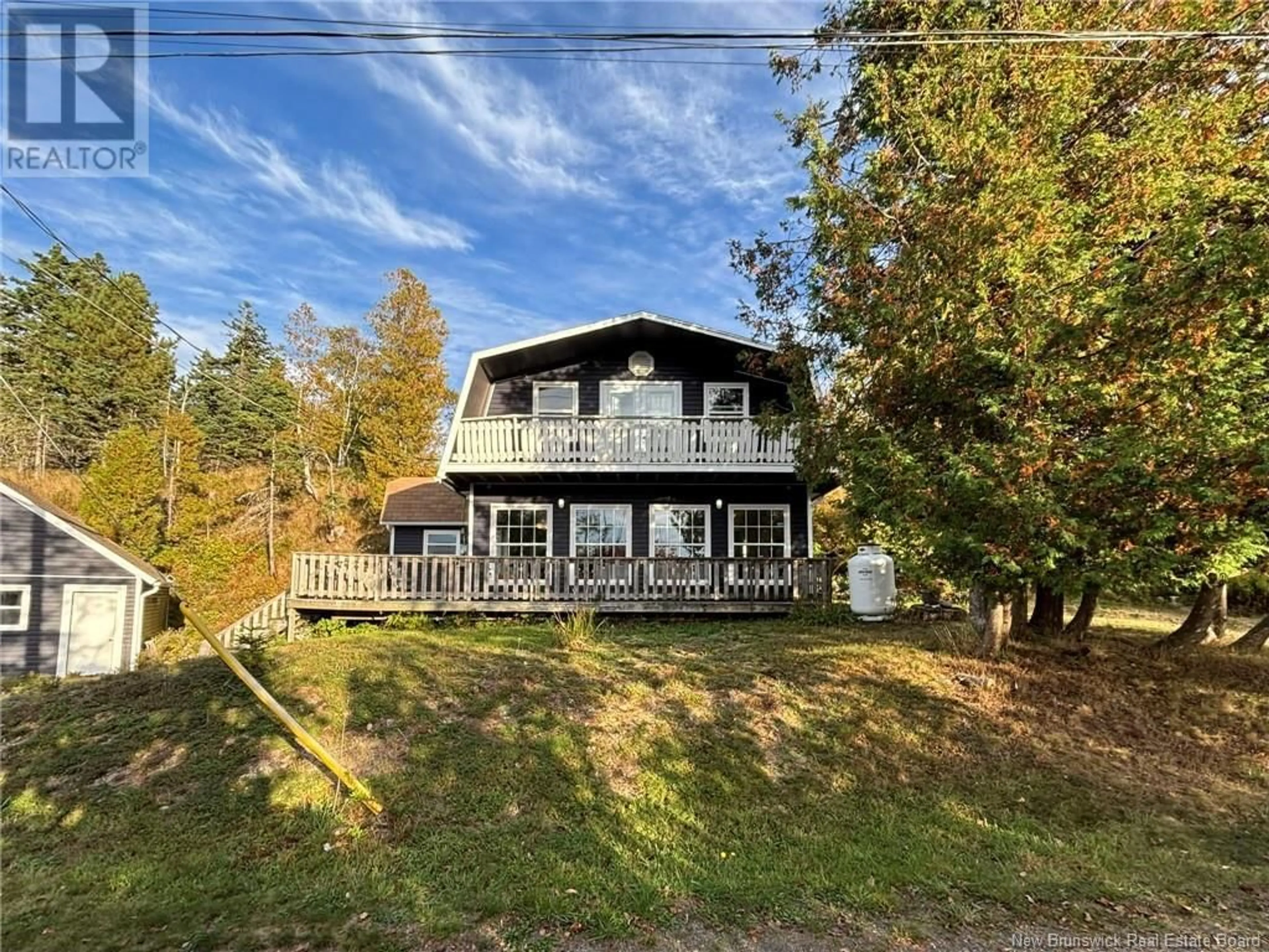 Frontside or backside of a home, cottage for 20 Cemetary Road, Grand Manan New Brunswick E5G4A2