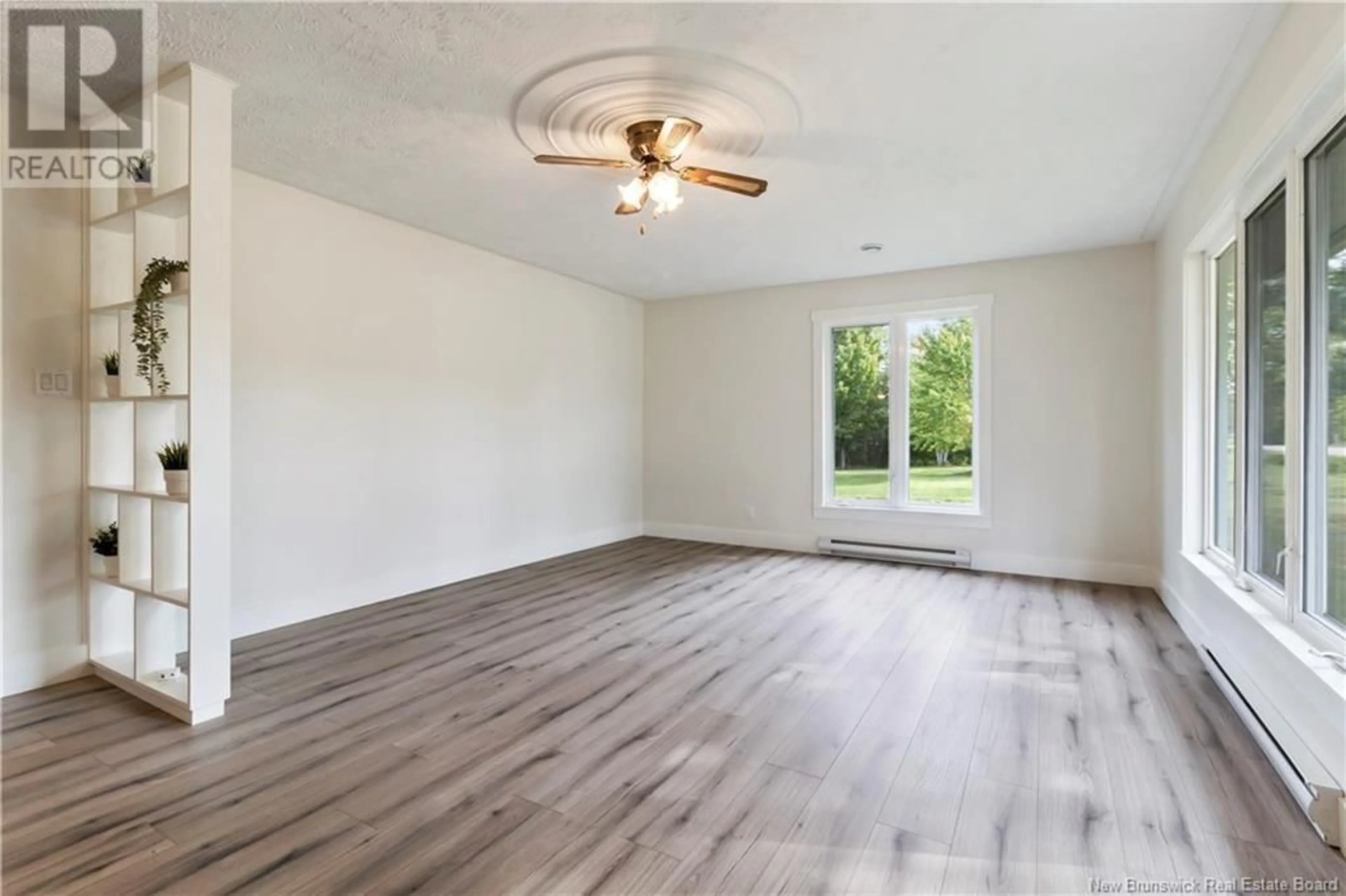 A pic of a room, wood floors for 1786 Cocagne Sud, Cocagne New Brunswick E4V1V9