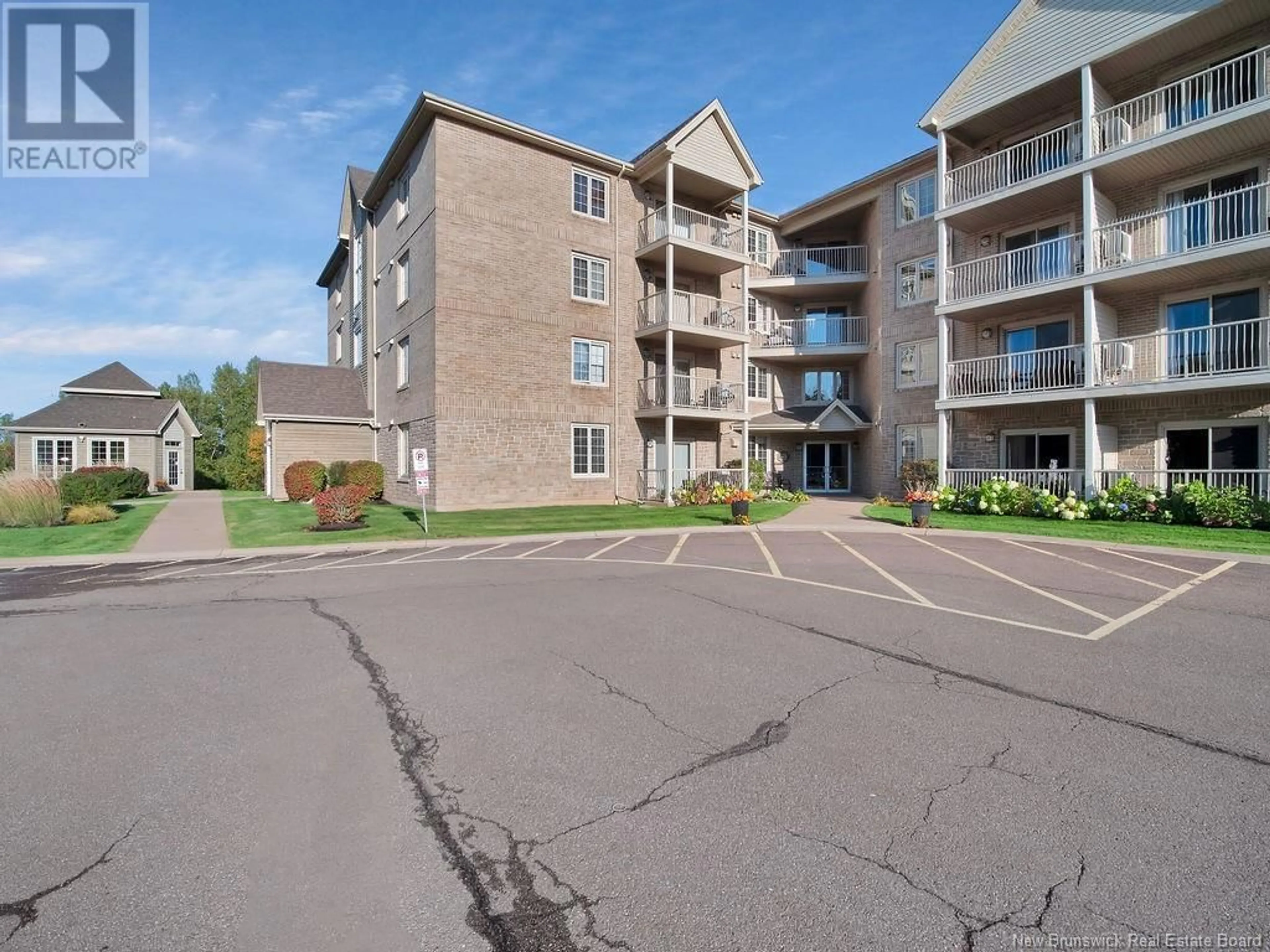 A pic from exterior of the house or condo, the front or back of building for 65 Diamond Head Court Unit# 109, Moncton New Brunswick E1G0V6