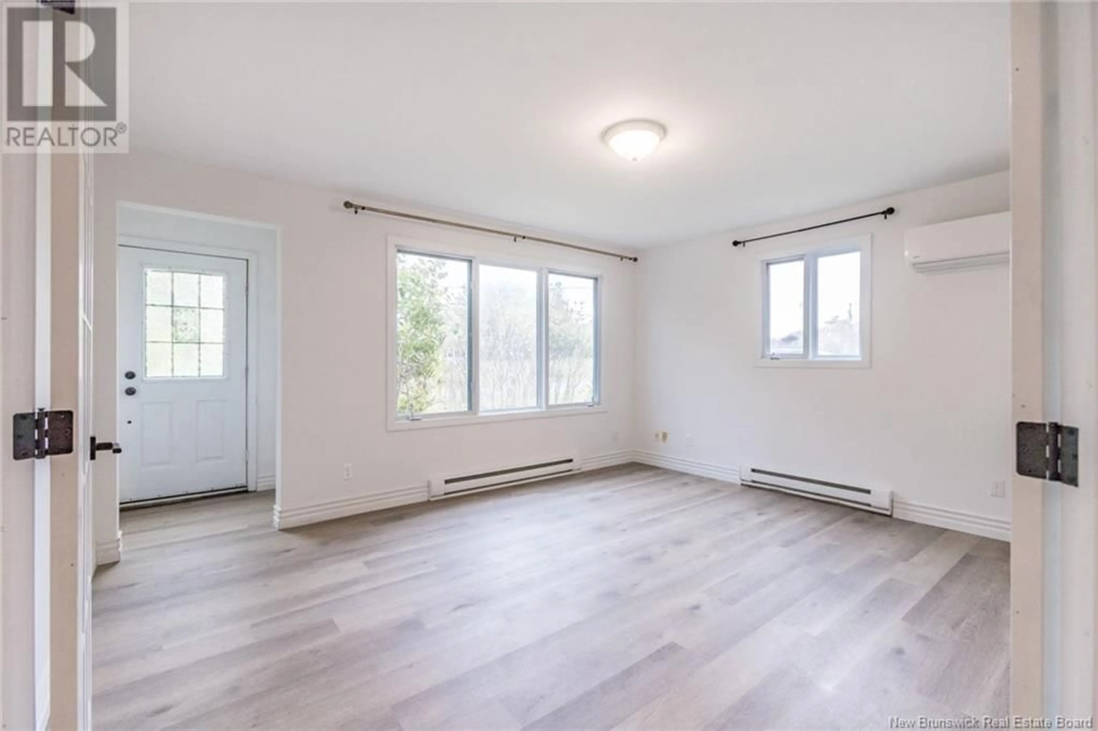 A pic of a room, wood floors for 3553 Loch Lomond Road, Saint John New Brunswick E2N1B9