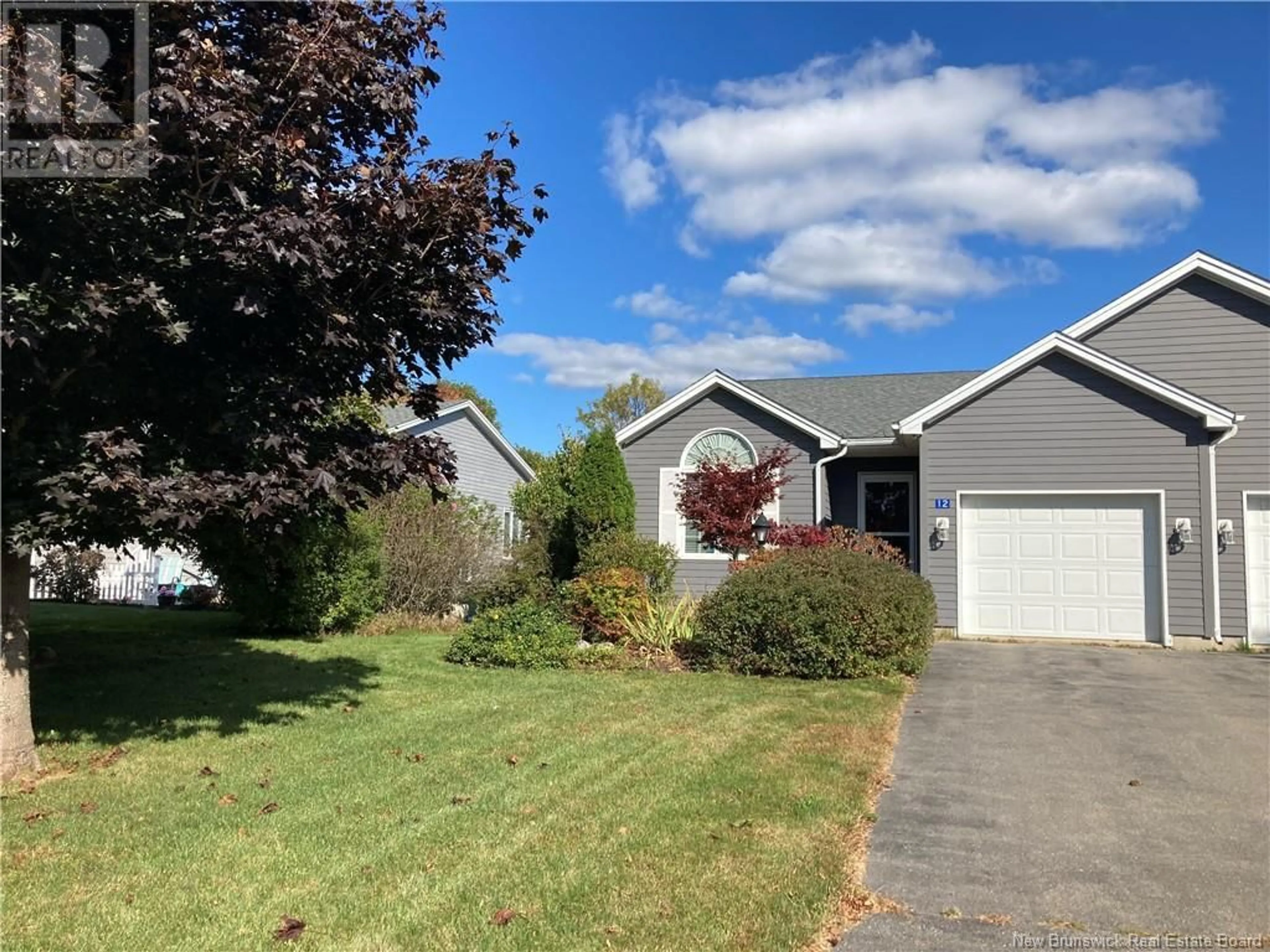 Frontside or backside of a home, the street view for 12 Mapledawn Court, Rothesay New Brunswick E2E5V6