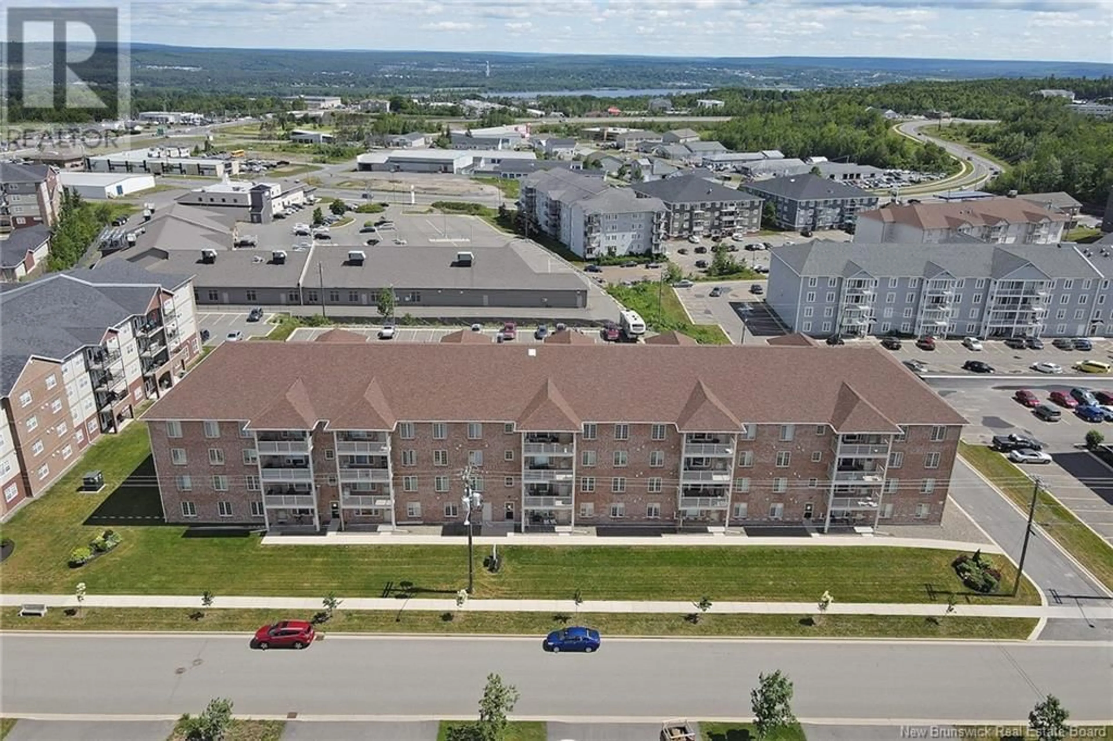 A pic from exterior of the house or condo, the front or back of building for 99 Valcour Drive Unit# 326, Fredericton New Brunswick E3C0J2