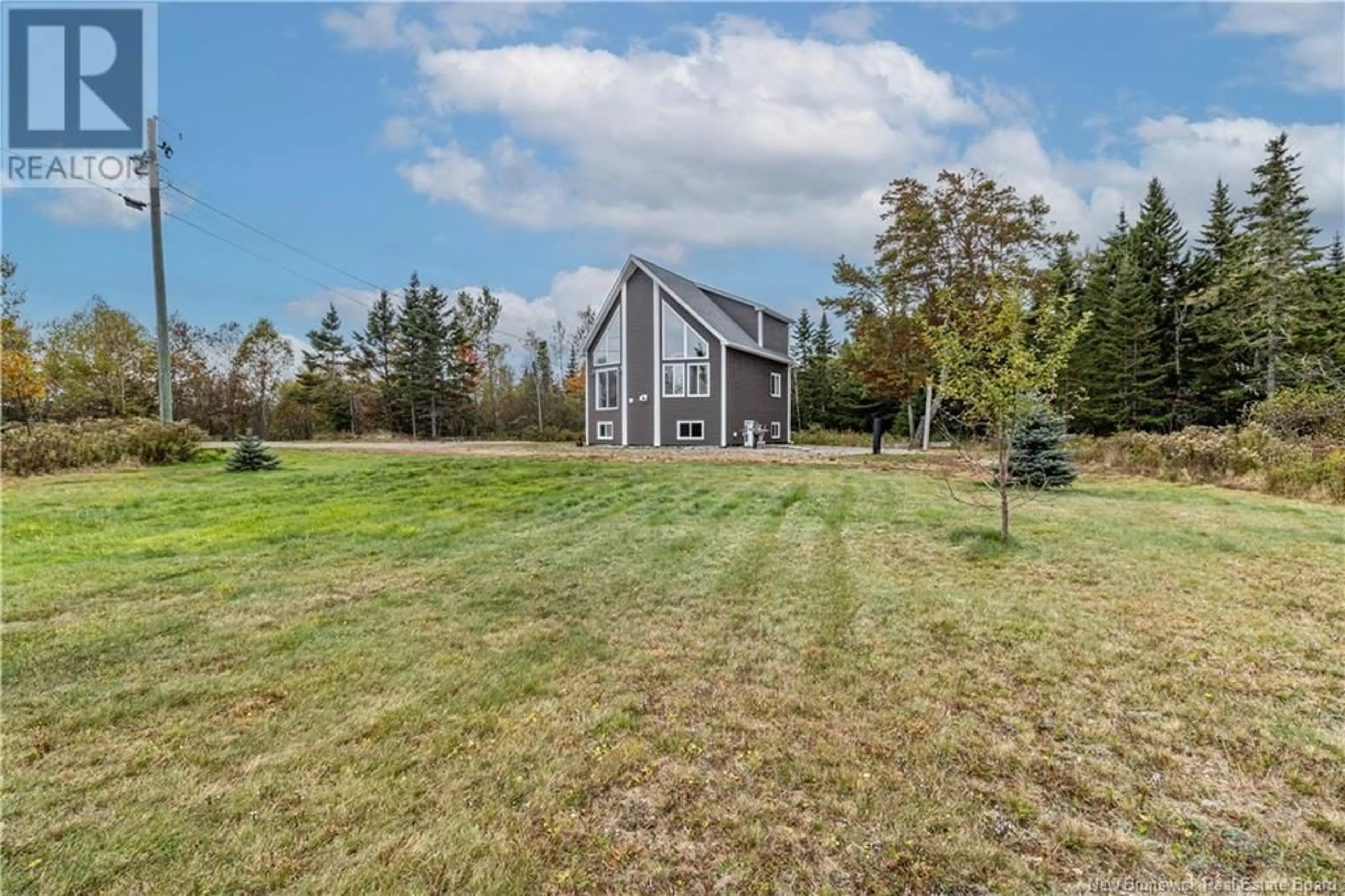 A pic from exterior of the house or condo, the fenced backyard for 744 Route 172, Back Bay New Brunswick E5C1W9