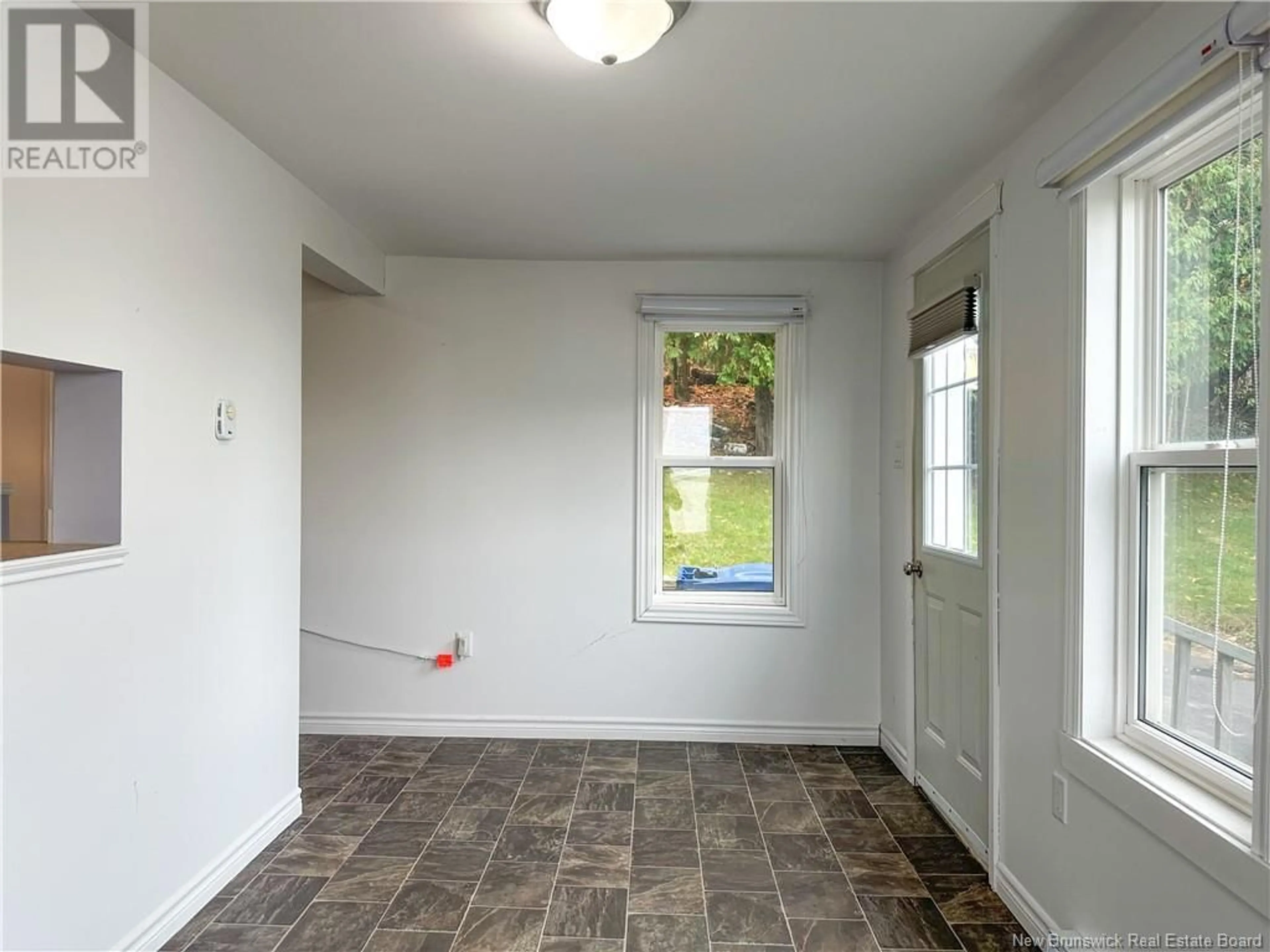 A pic of a room, wood floors for 185 Houlton Street, Woodstock New Brunswick E7M1Y7