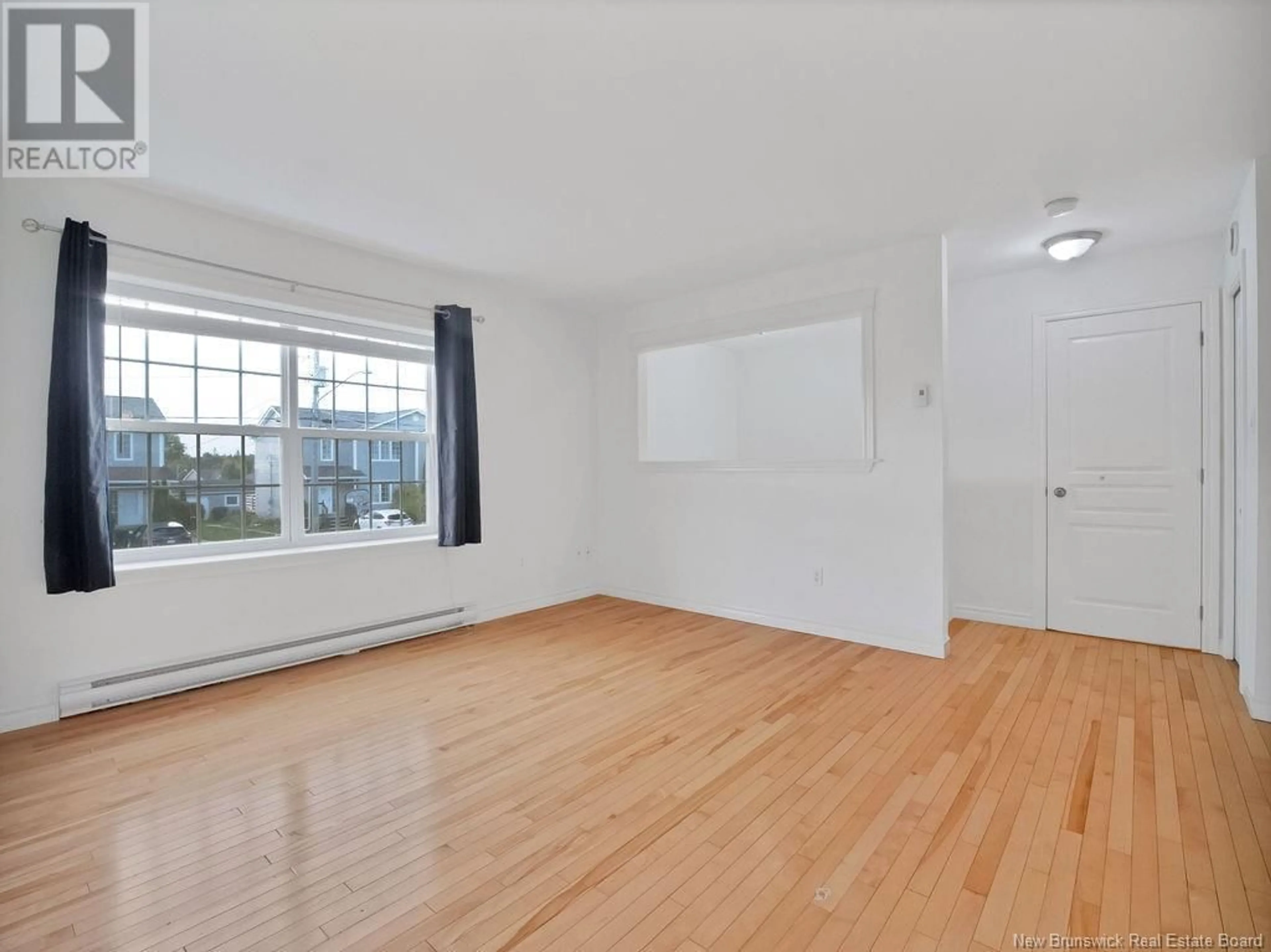 A pic of a room, wood floors for 189 Penrose St, Moncton New Brunswick E1E4W7