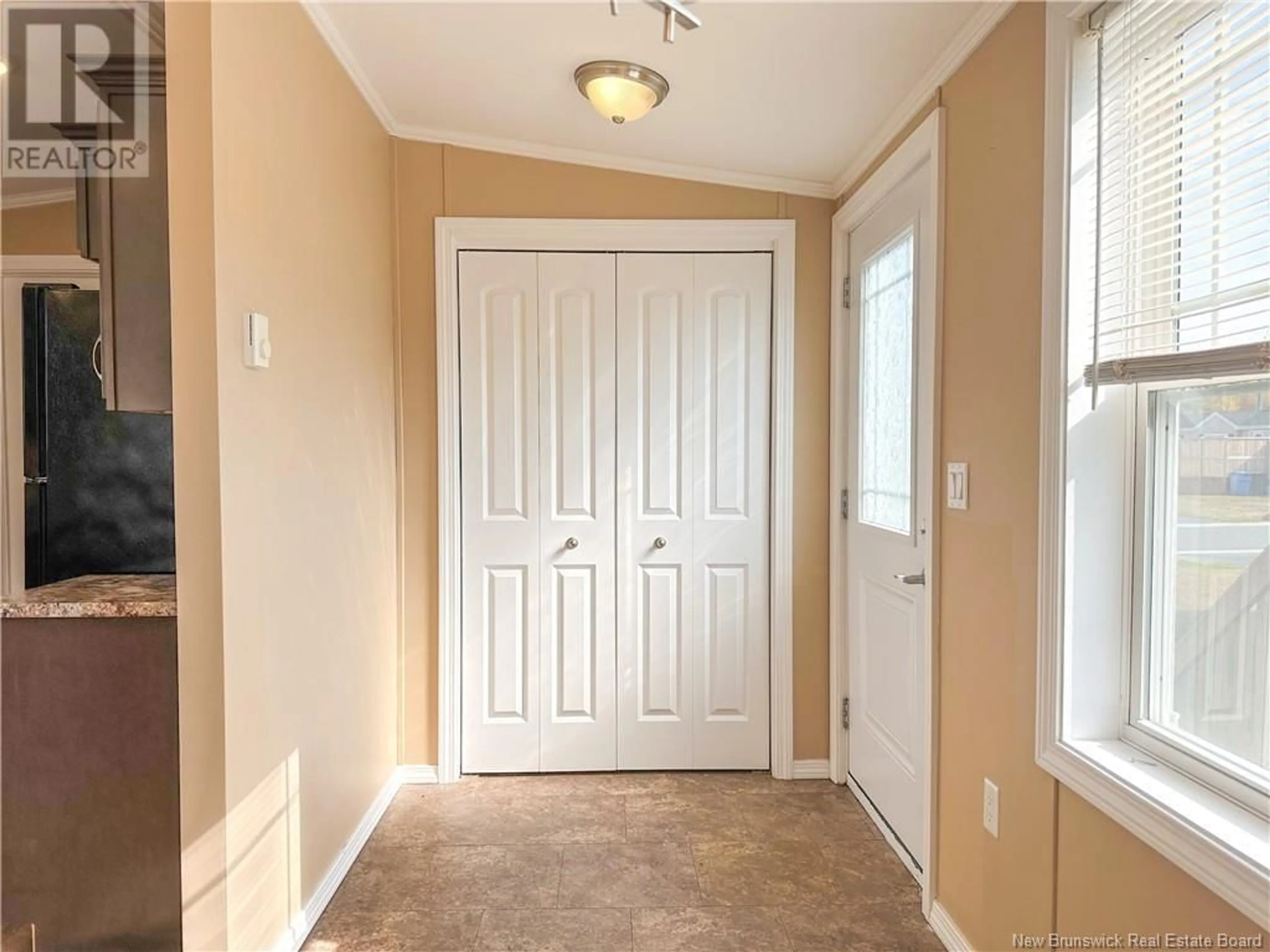 Indoor entryway, wood floors for 14 Ivory Court, Woodstock New Brunswick E7M0G5