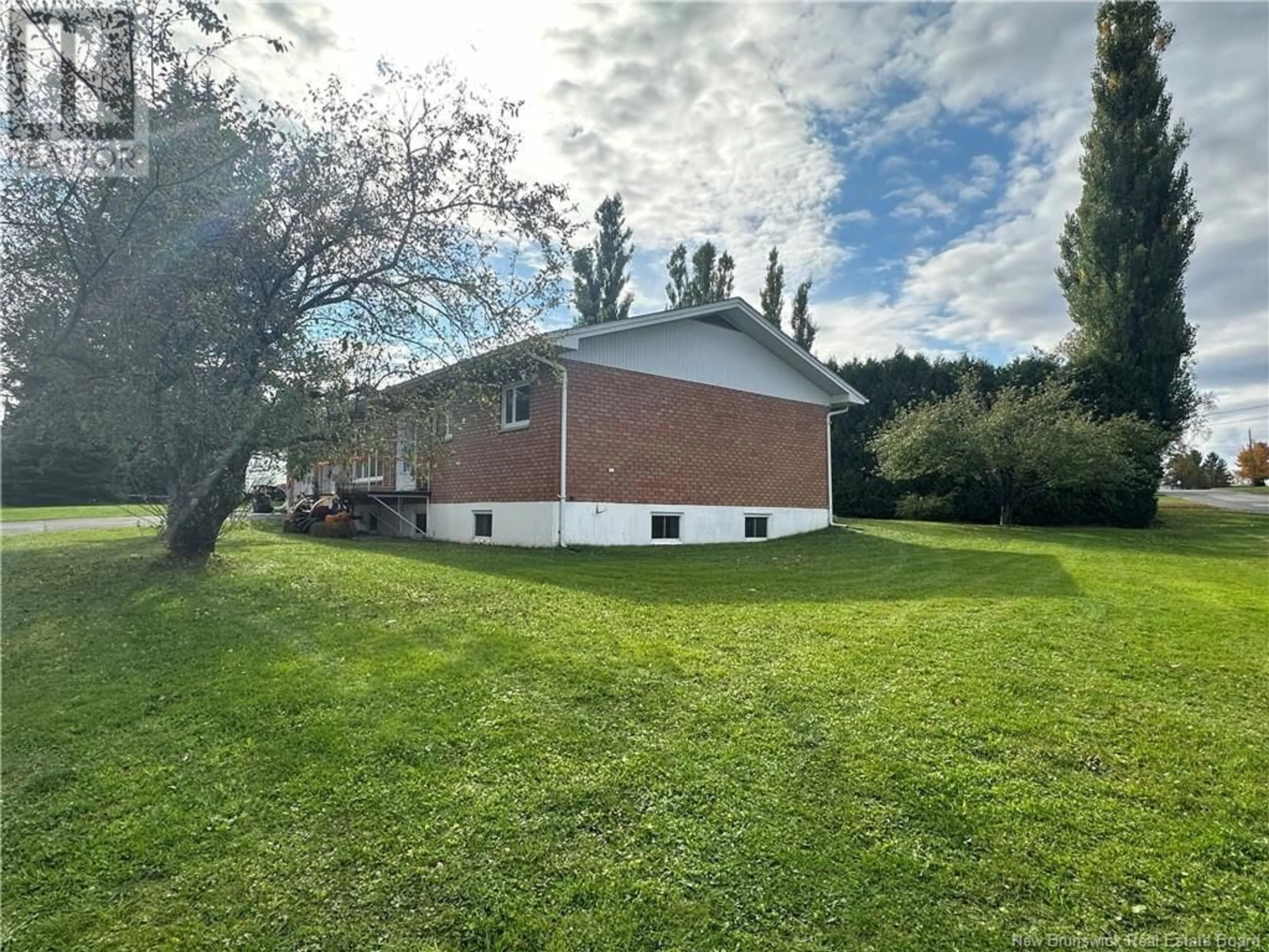 Frontside or backside of a home, the fenced backyard for 12 Colebrooke Road, Grand-Sault/Grand Falls New Brunswick E3Z1A8