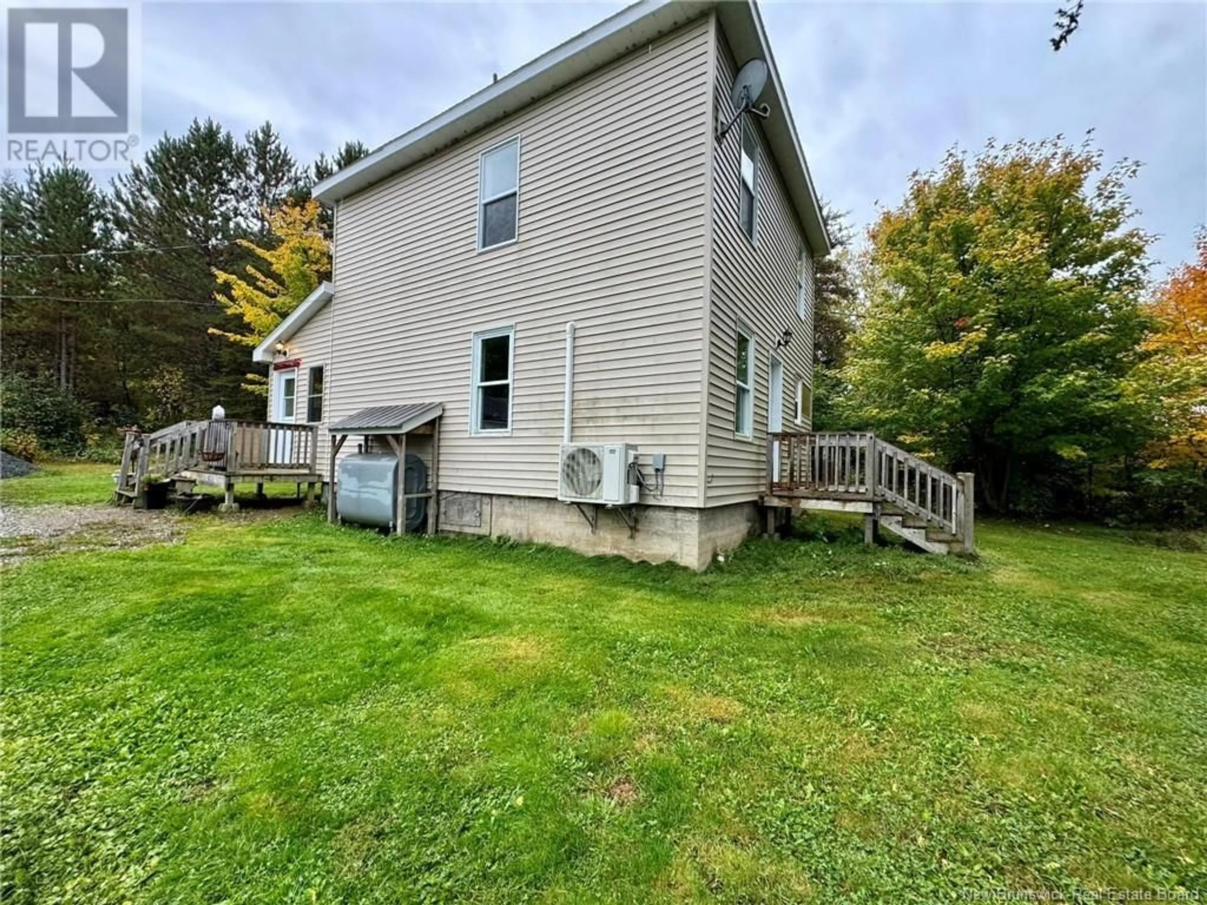 Frontside or backside of a home, the fenced backyard for 1636 Northwest Road, Sevogle New Brunswick E9E1M5