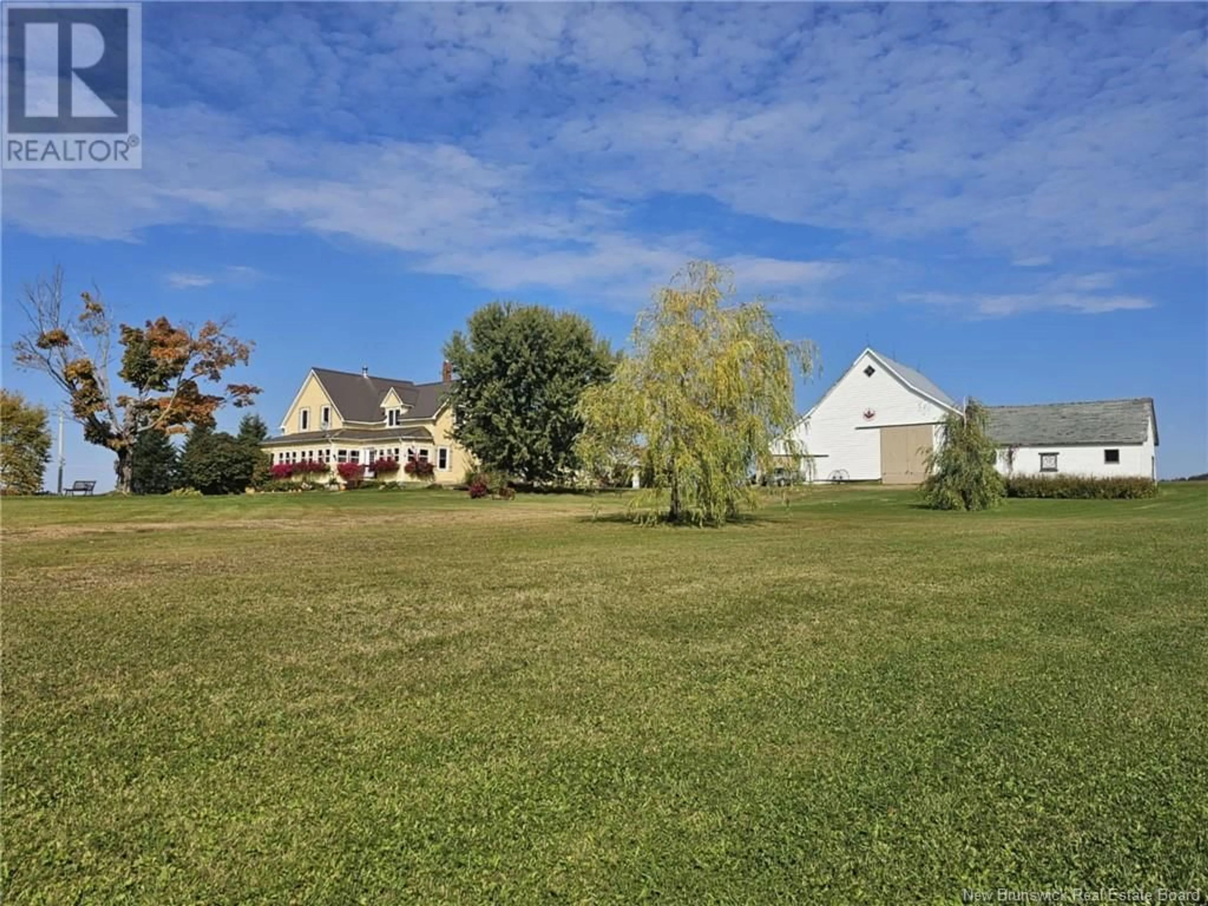 Frontside or backside of a home, the fenced backyard for 1205 Route 380, New Denmark New Brunswick E7G3A2