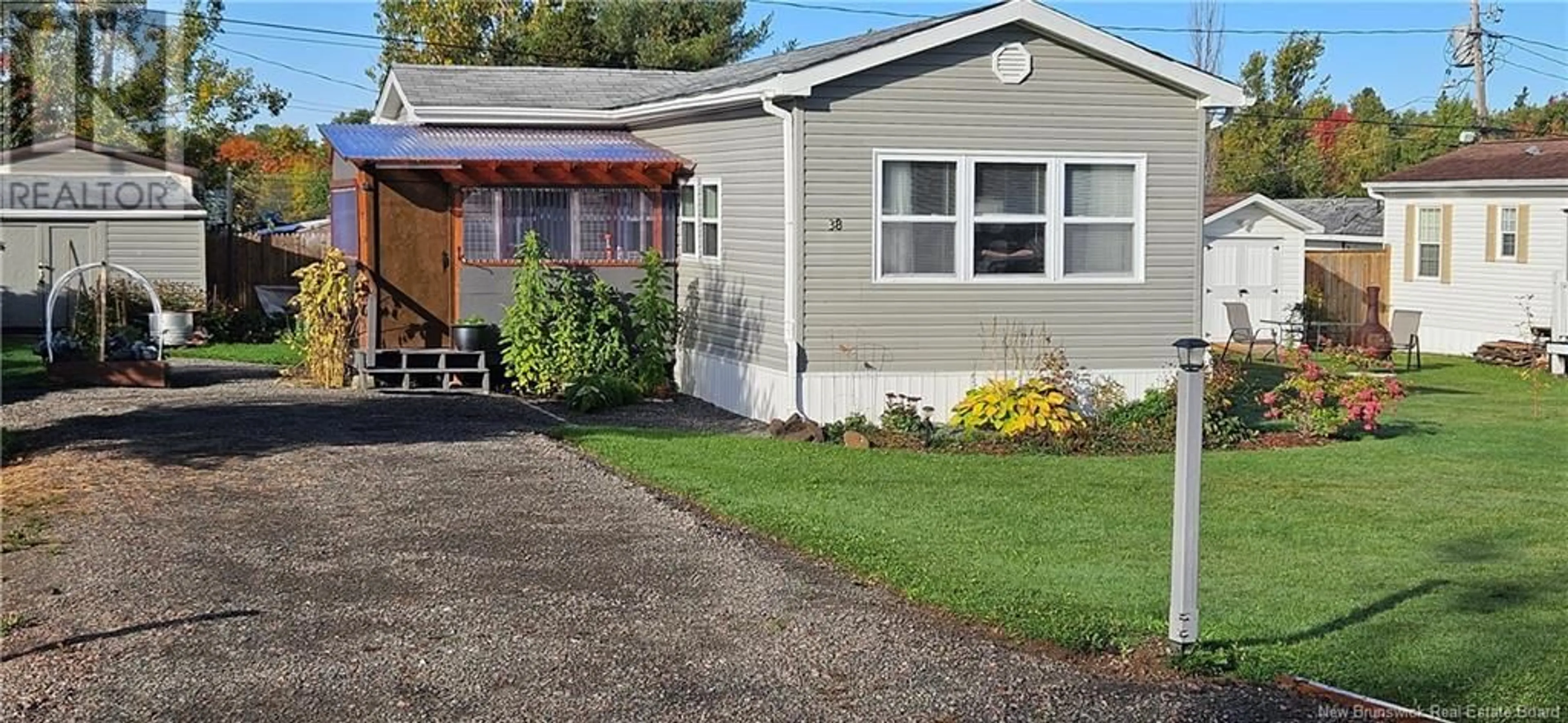 Home with vinyl exterior material for 38 Dupuis Avenue, Lakeville New Brunswick E1H1E2