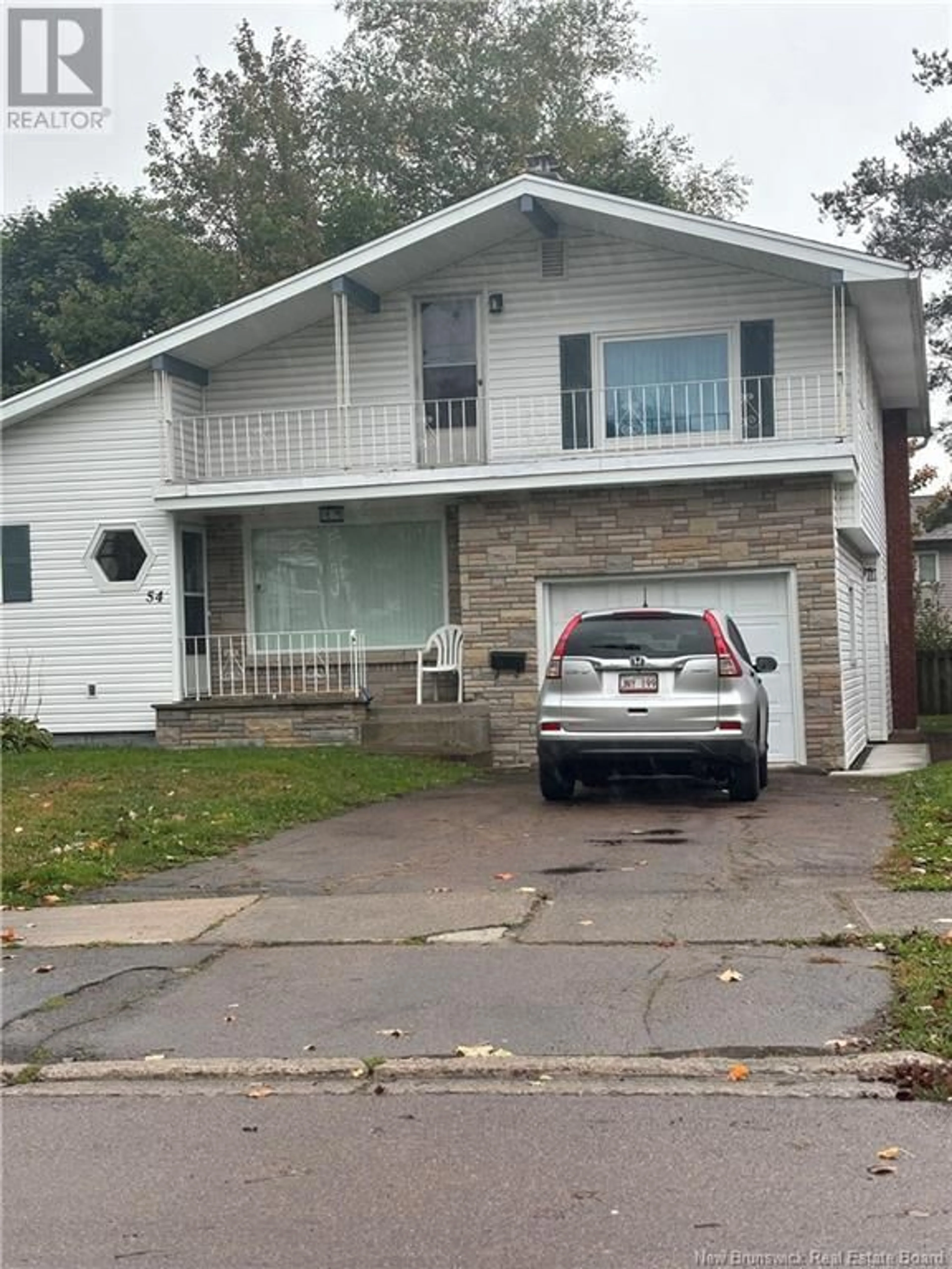 Frontside or backside of a home, the street view for 54 Vine, Moncton New Brunswick E1E1J9