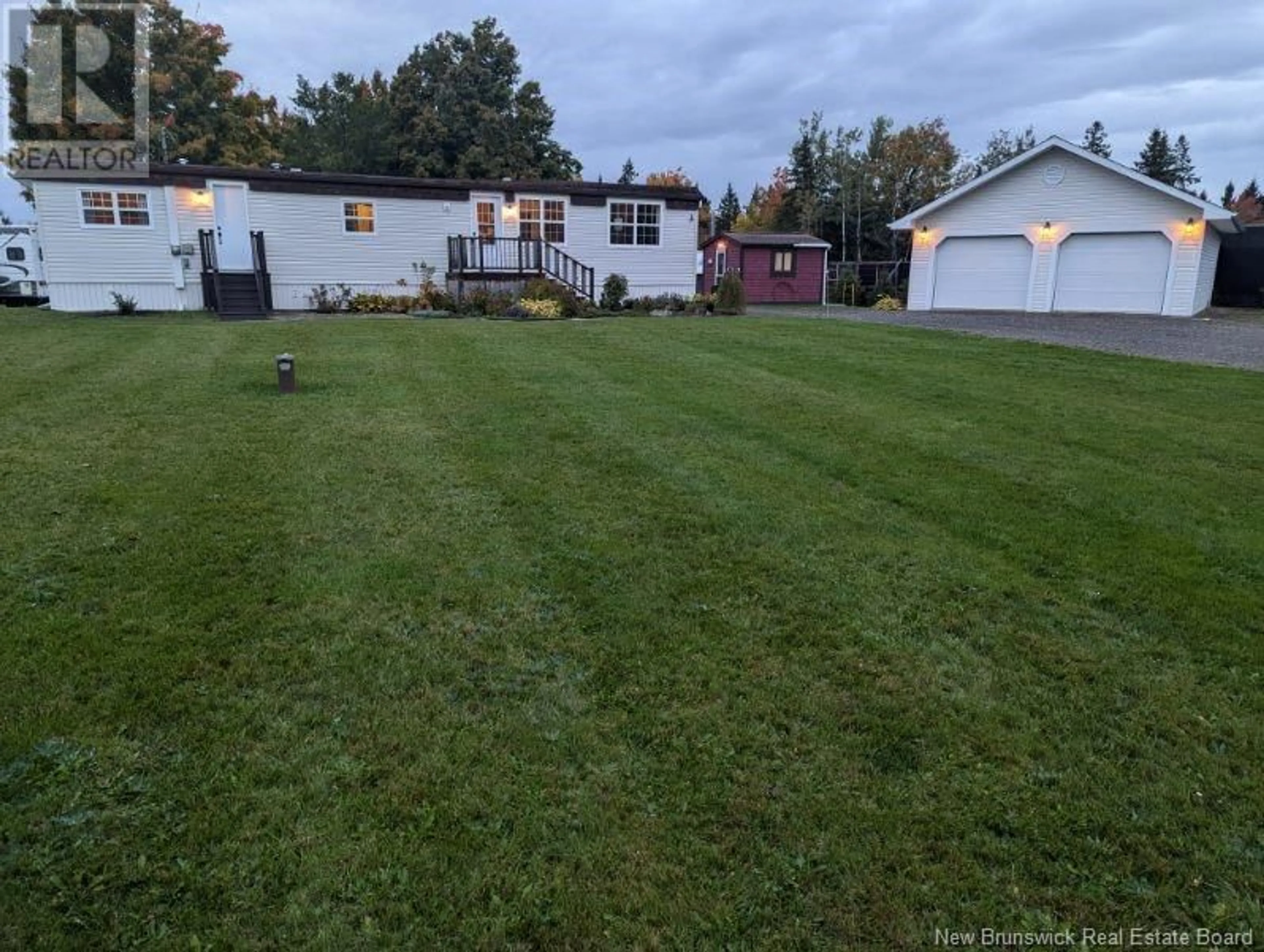 Frontside or backside of a home, the fenced backyard for 1566 Saint Charles Sud Road, Saint-Charles New Brunswick E4W4Y3