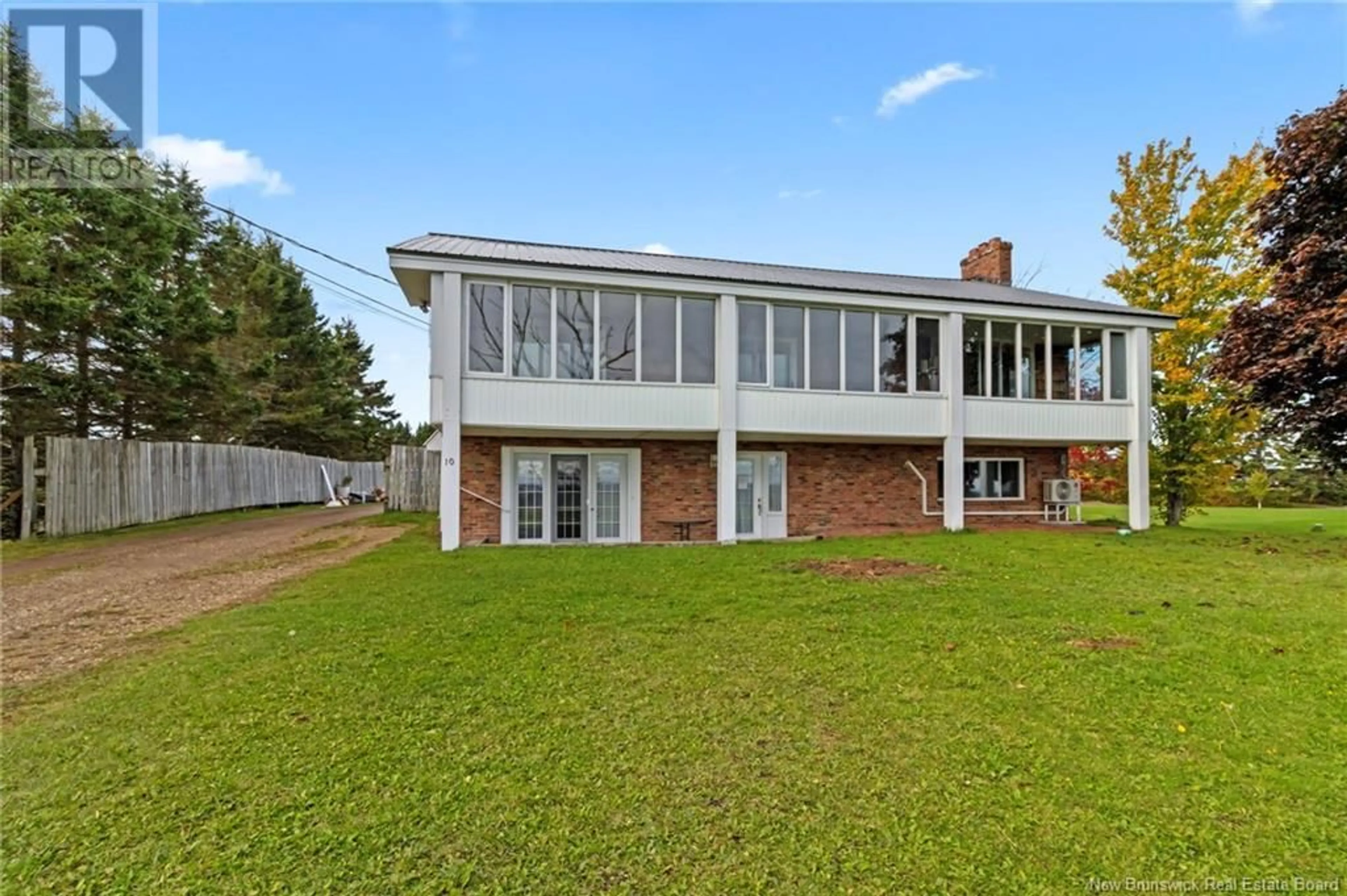 Frontside or backside of a home, the fenced backyard for 10 Nigarry Road, Memramcook New Brunswick E4K1H8