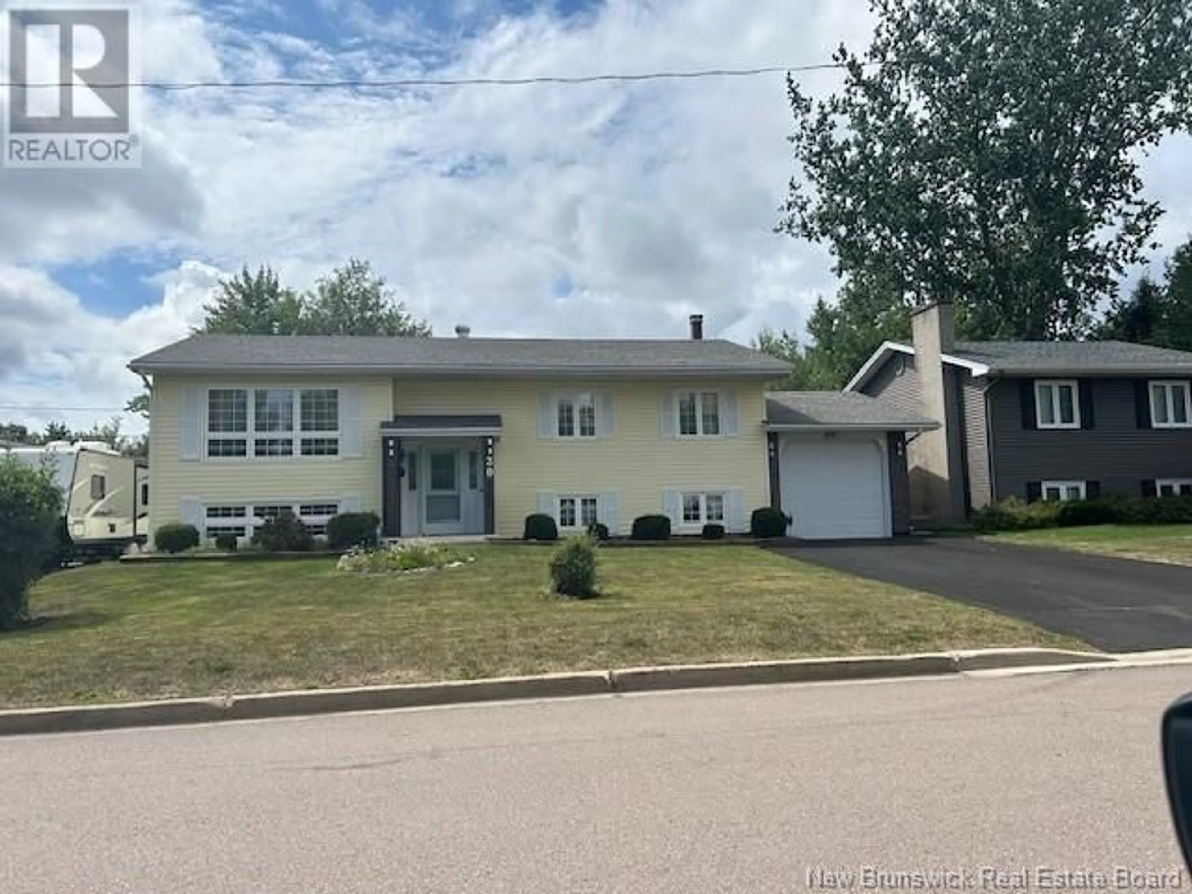 Home with vinyl exterior material, street for 20 WOODLEIGH STREET, Moncton New Brunswick E1C9A4