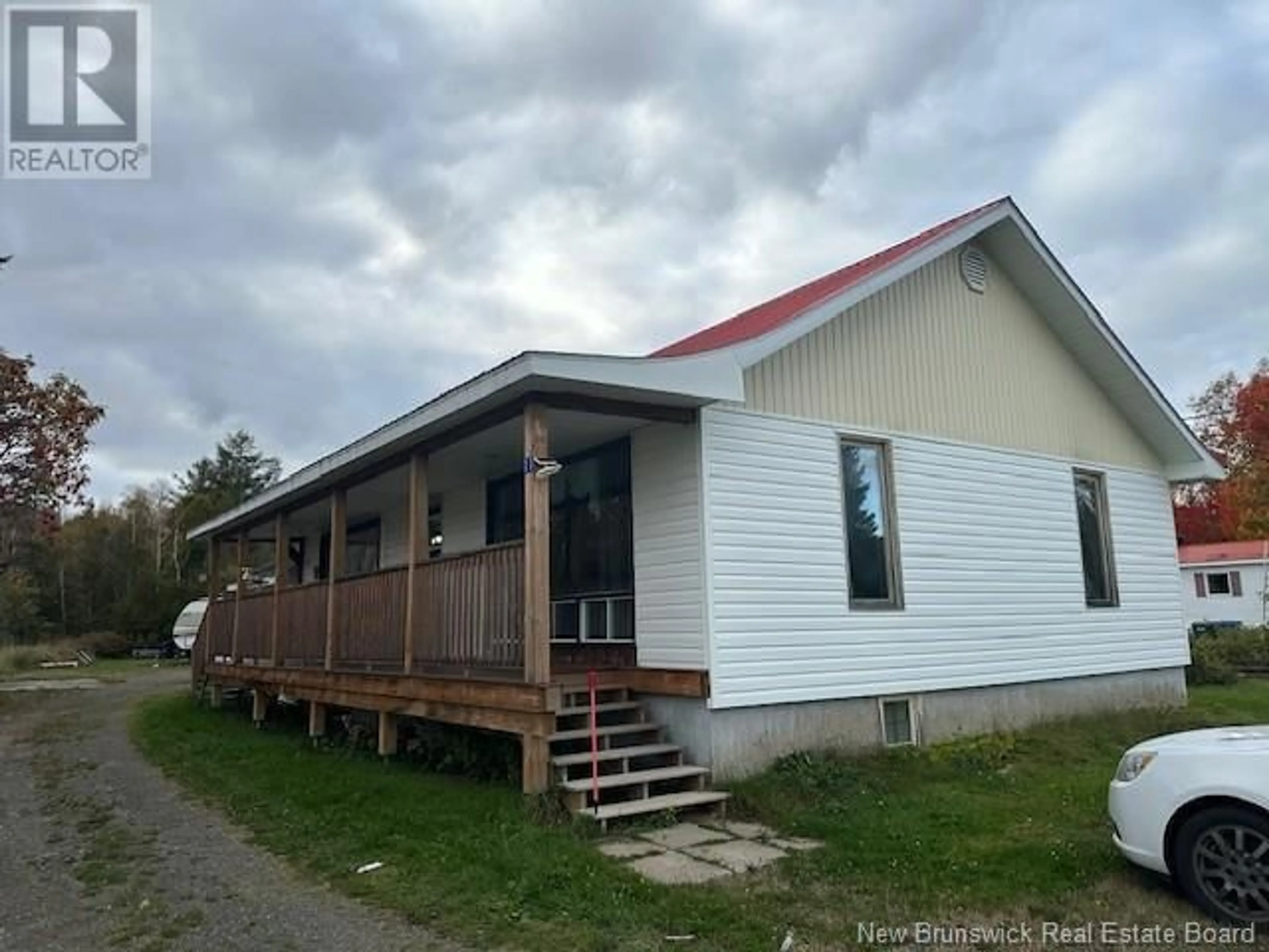 Frontside or backside of a home, the front or back of building for 11 Cayouette Street, Eel River Crossing New Brunswick E8E1N9