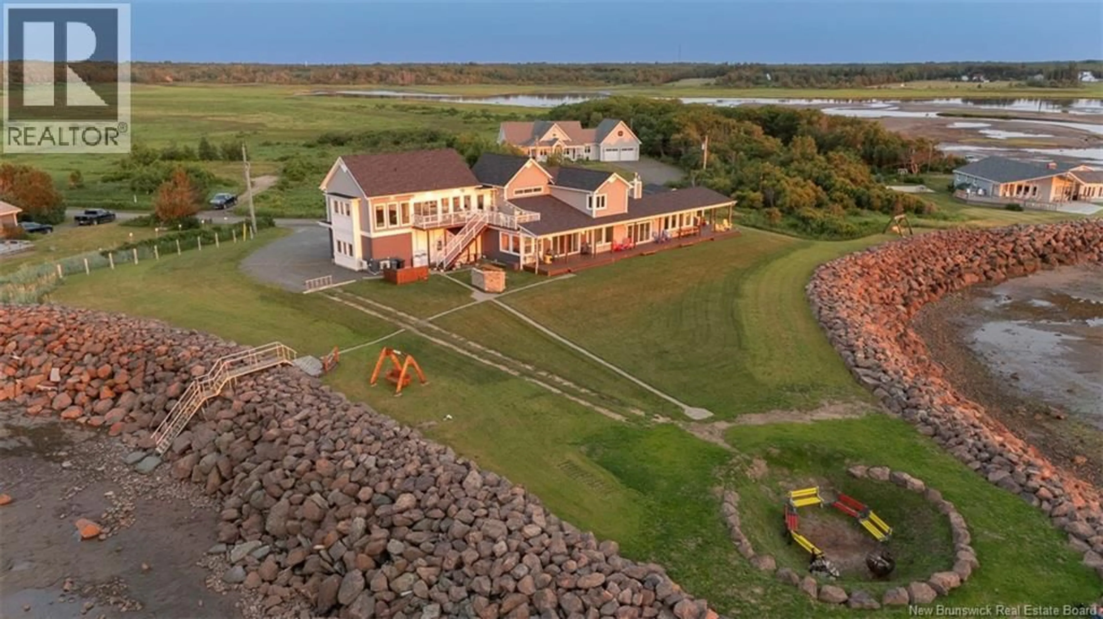 A pic from outside/outdoor area/front of a property/back of a property/a pic from drone, building for 75 P'TIT BARACHOIS ROAD, Grand-Barachois New Brunswick E4P7Y2