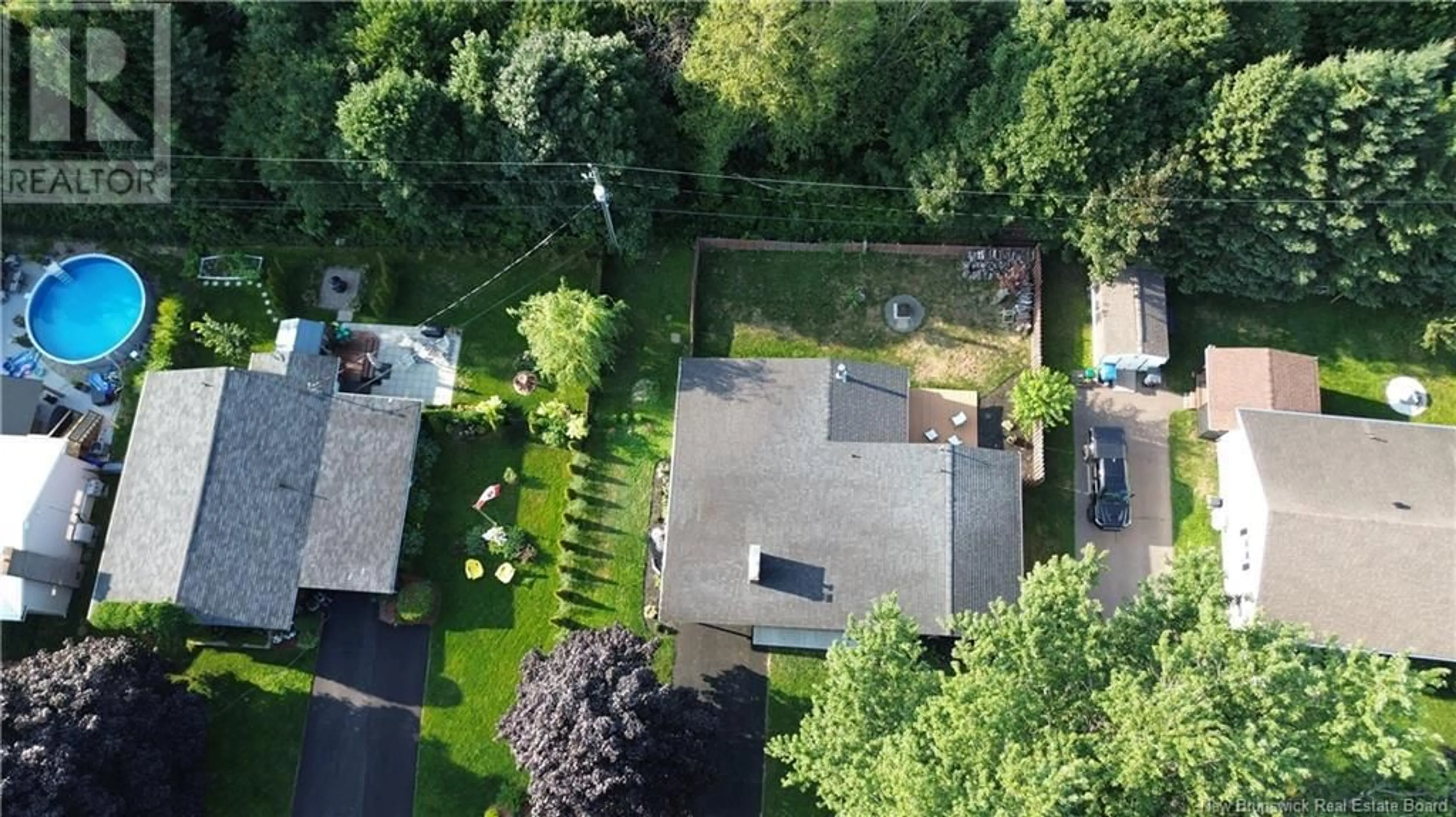 Frontside or backside of a home, the fenced backyard for 258 Denys Avenue, Dieppe New Brunswick E1A1B9