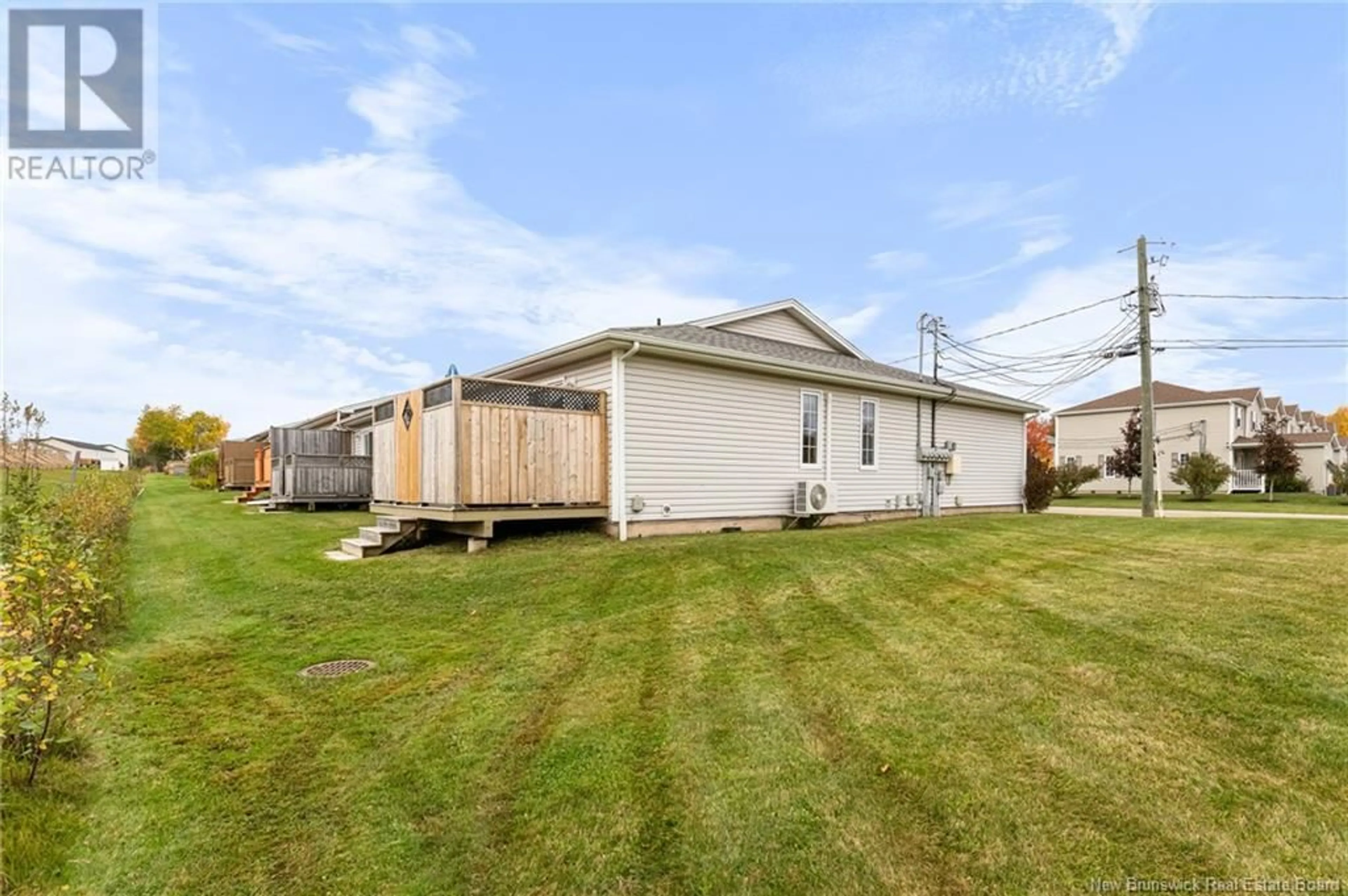 Frontside or backside of a home, the fenced backyard for 81 Domethilde Crescent, Dieppe New Brunswick E1A8R4