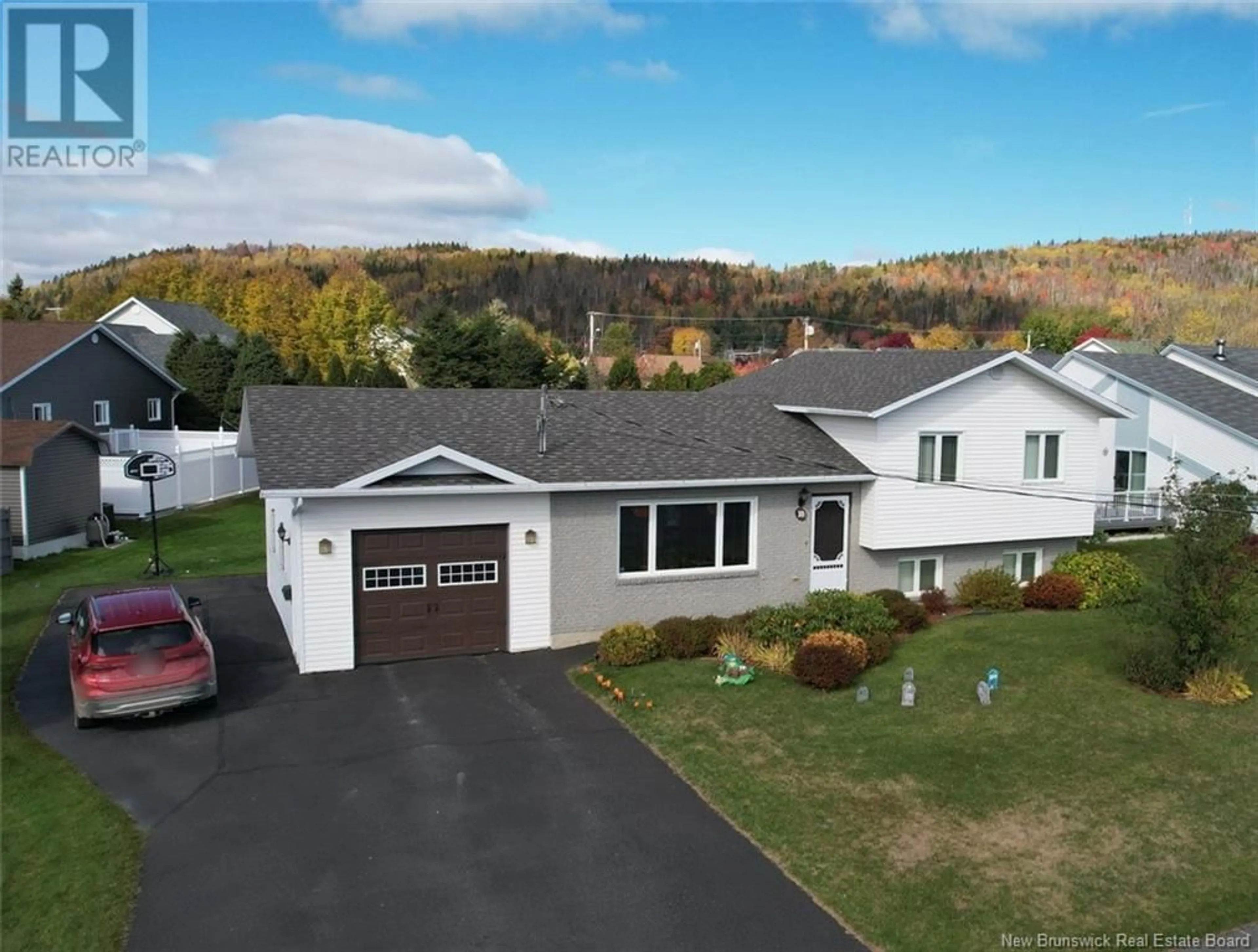 Home with vinyl exterior material for 10 Dr Gaudreau Avenue, Edmundston New Brunswick E3V4Z4