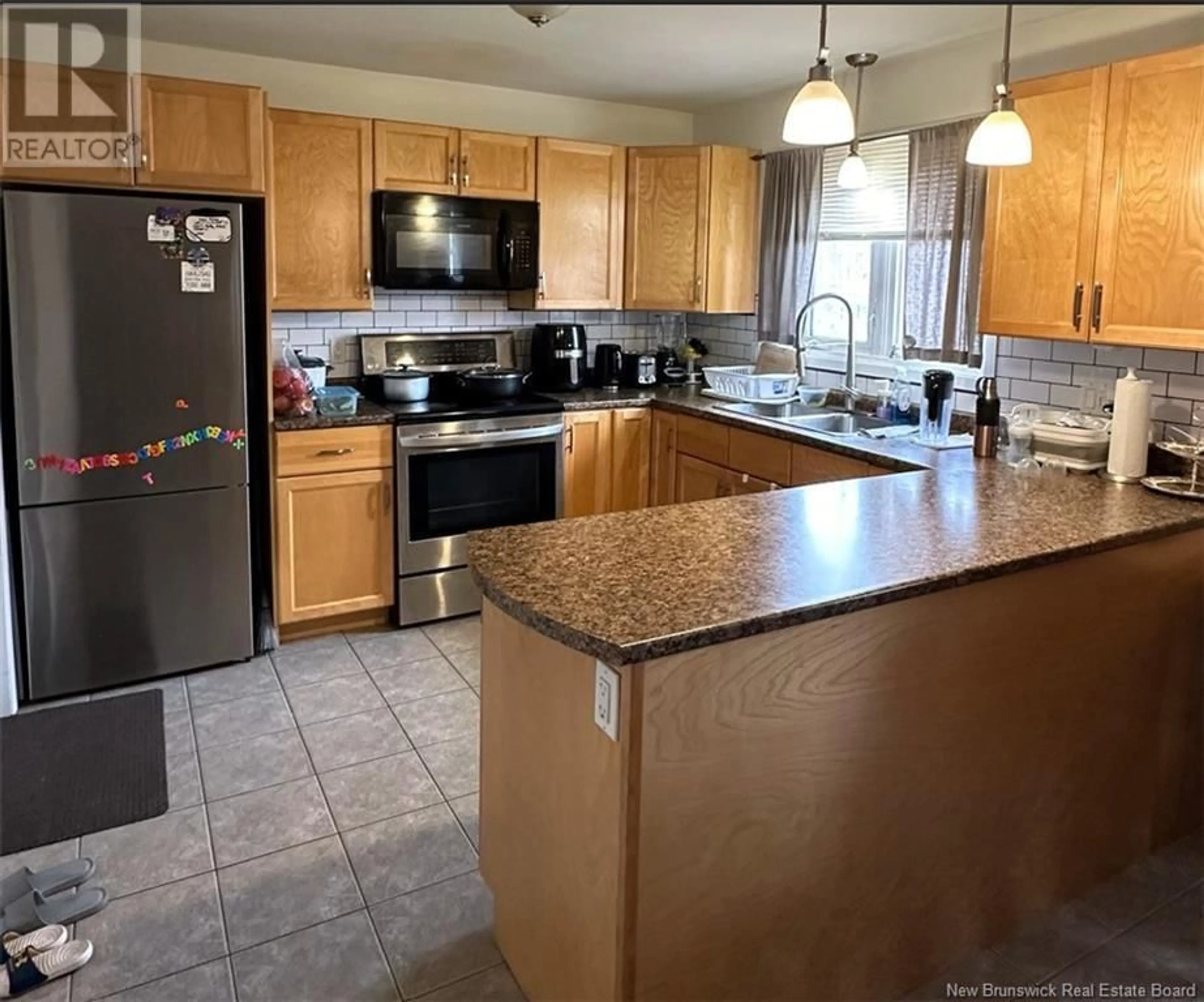 Standard kitchen, cement floor for 215 Spruce Street, Moncton New Brunswick E1C7K5