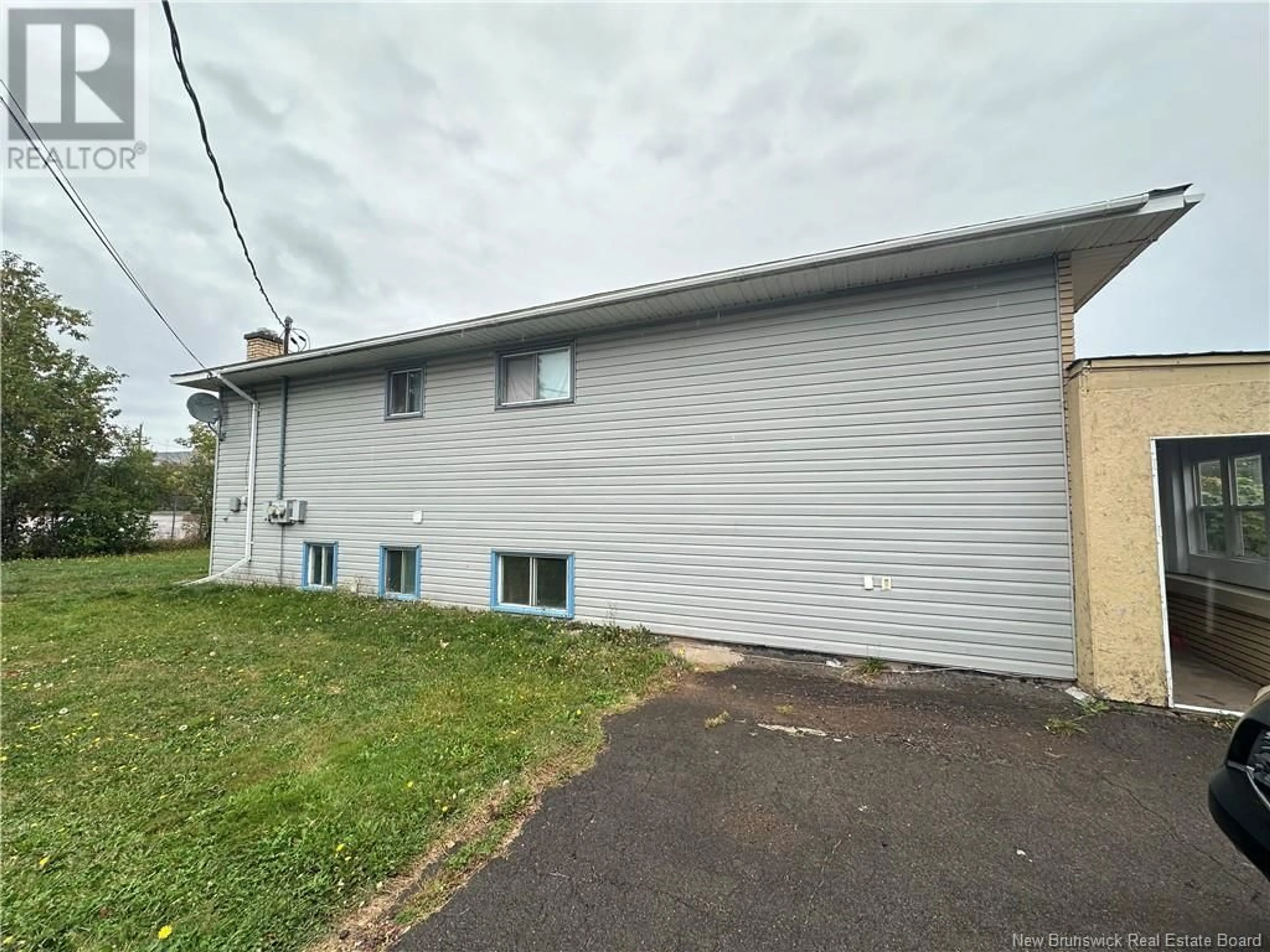 Frontside or backside of a home, the front or back of building for 7-9 Crescent Avenue, Moncton New Brunswick E1A3J2