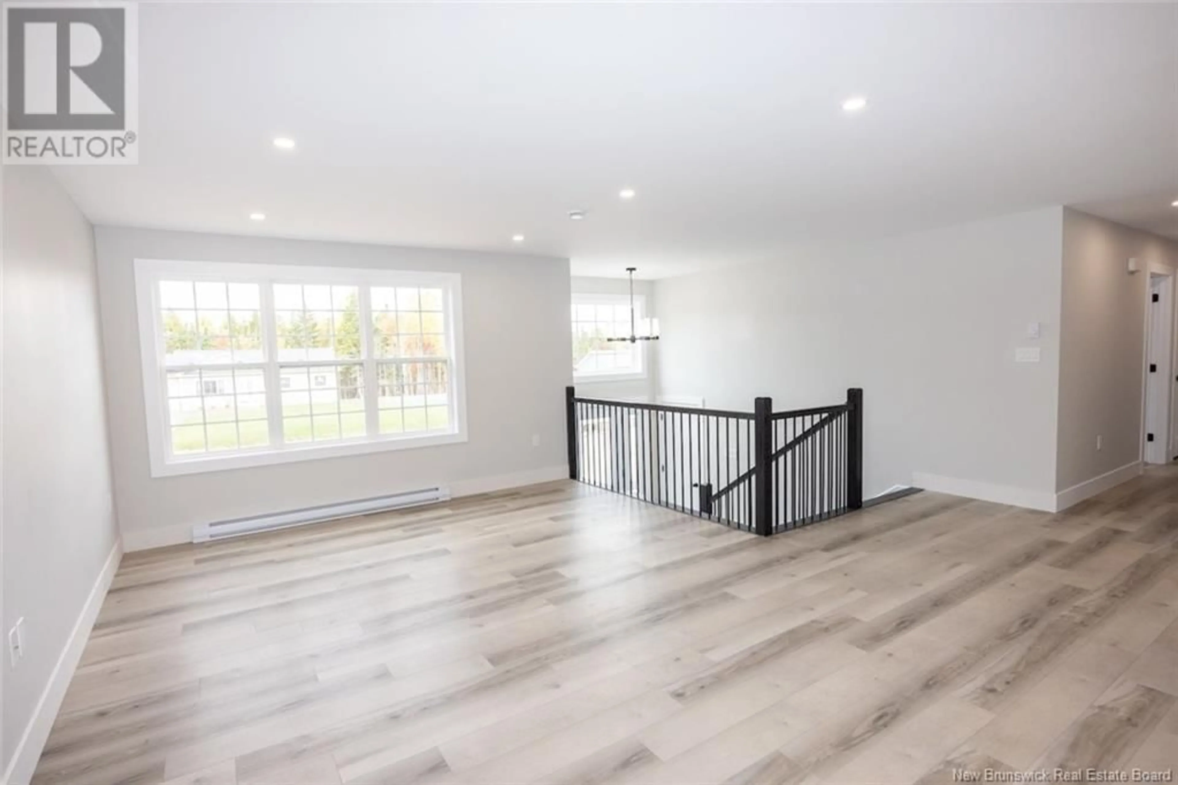 A pic of a room, wood floors for 66 Sandlewood Lane, Douglas New Brunswick E3G0E7