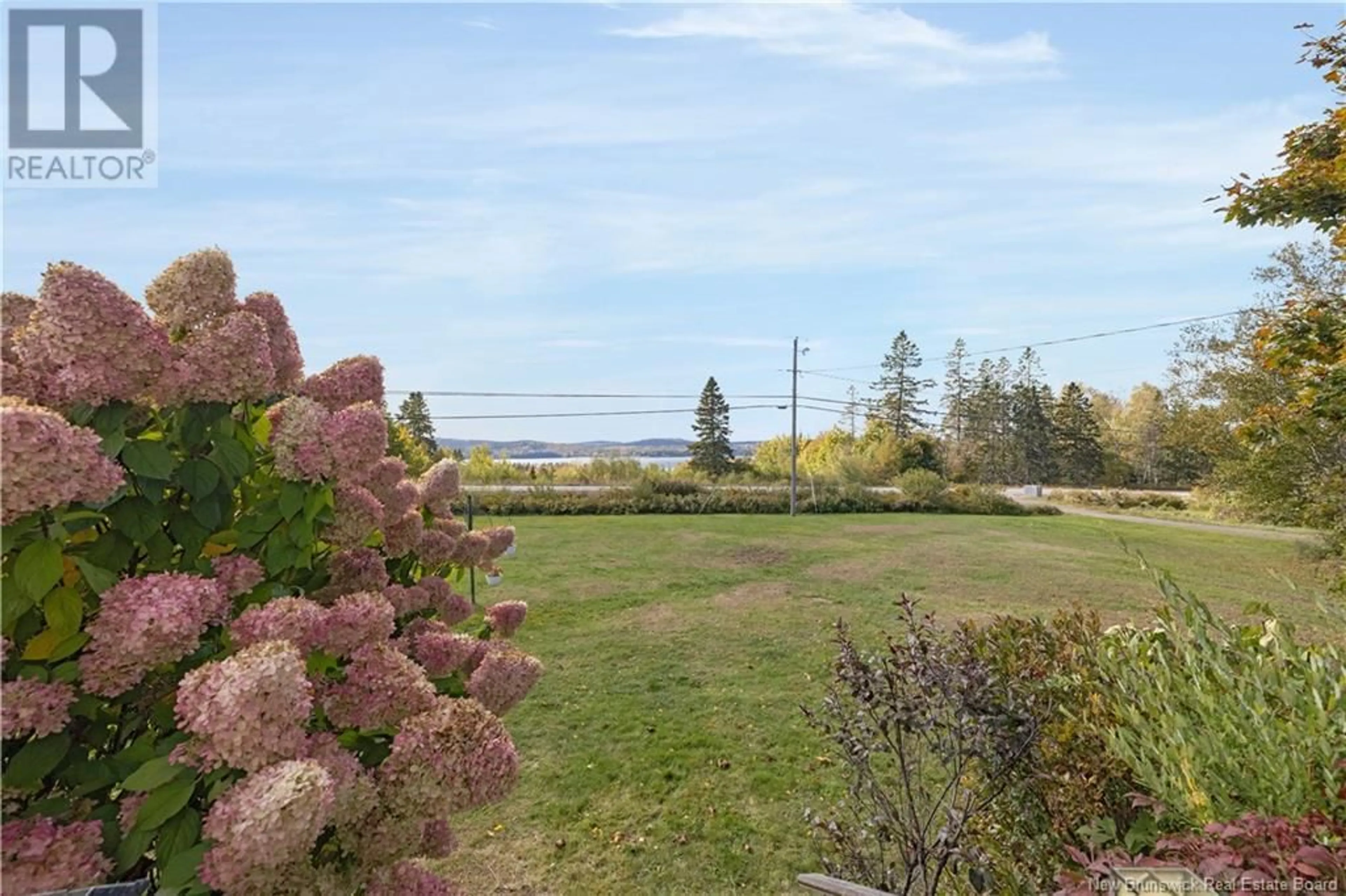 Patio, the fenced backyard for 3573 Route 127, Bayside New Brunswick E5B2S9