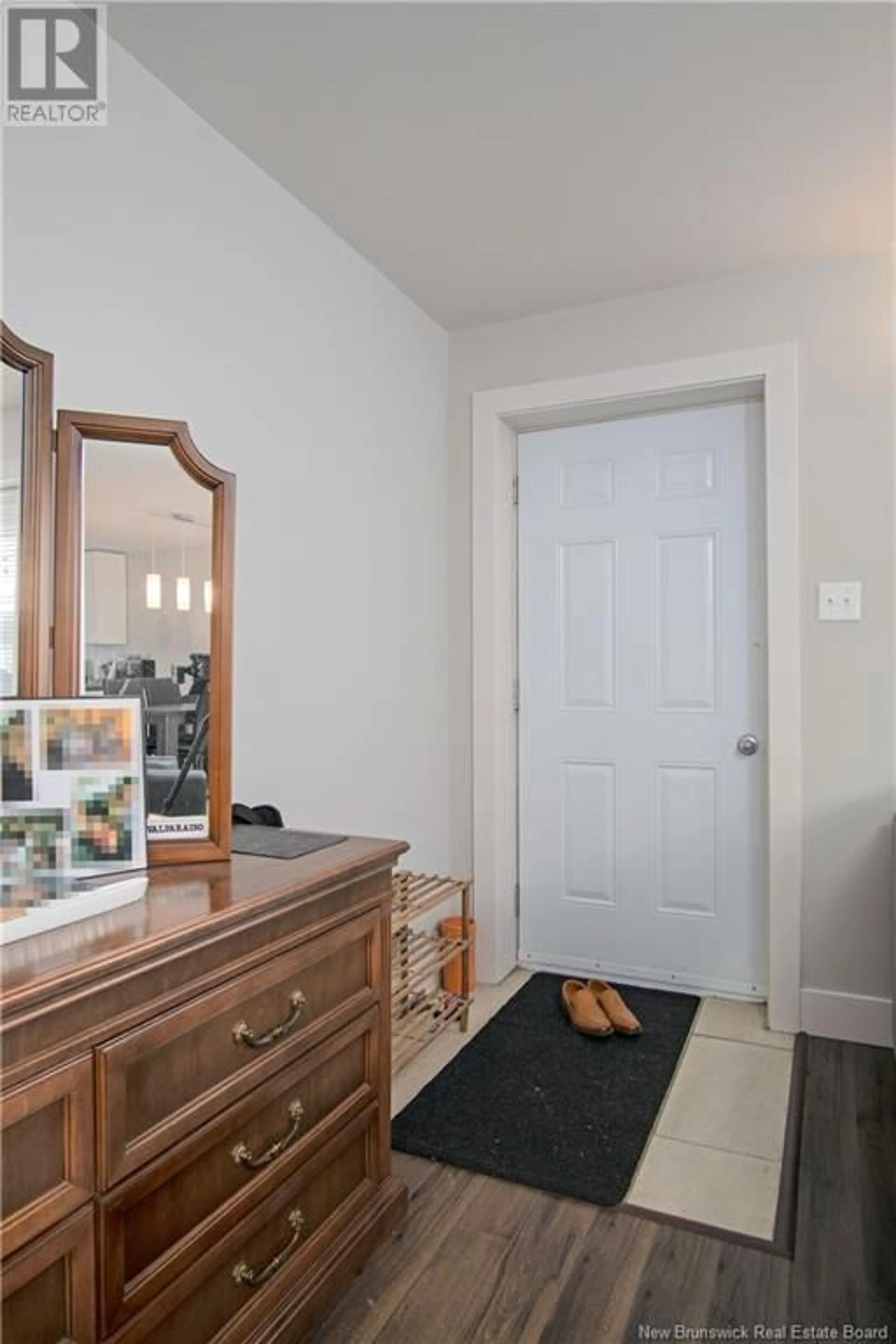 Indoor entryway, wood floors for 24 Rockingstone Drive, Saint John New Brunswick E2M0B5