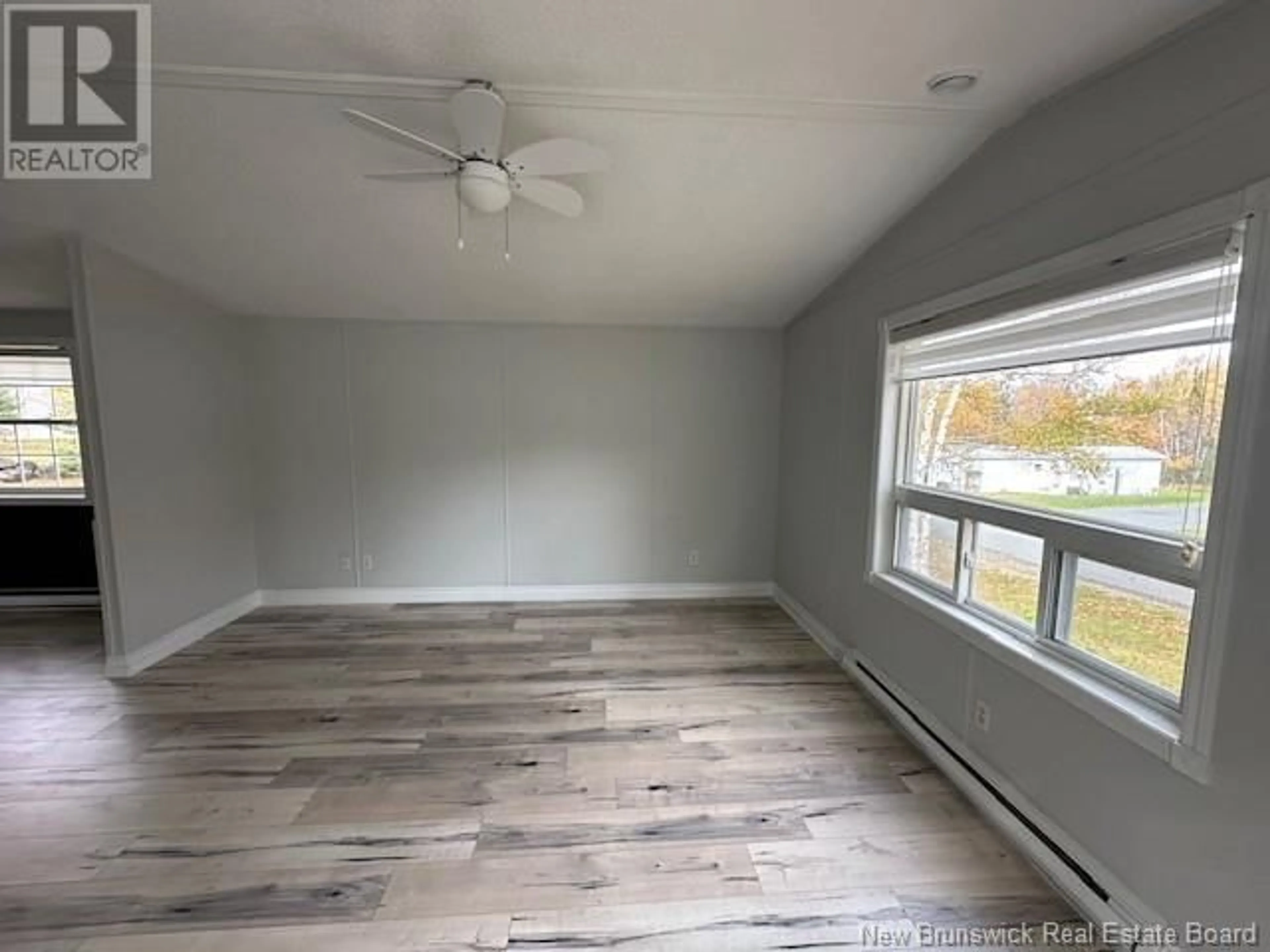 A pic of a room, wood floors for 20 Maple Green Crescent, Dalhousie Junction New Brunswick E3N5Z3