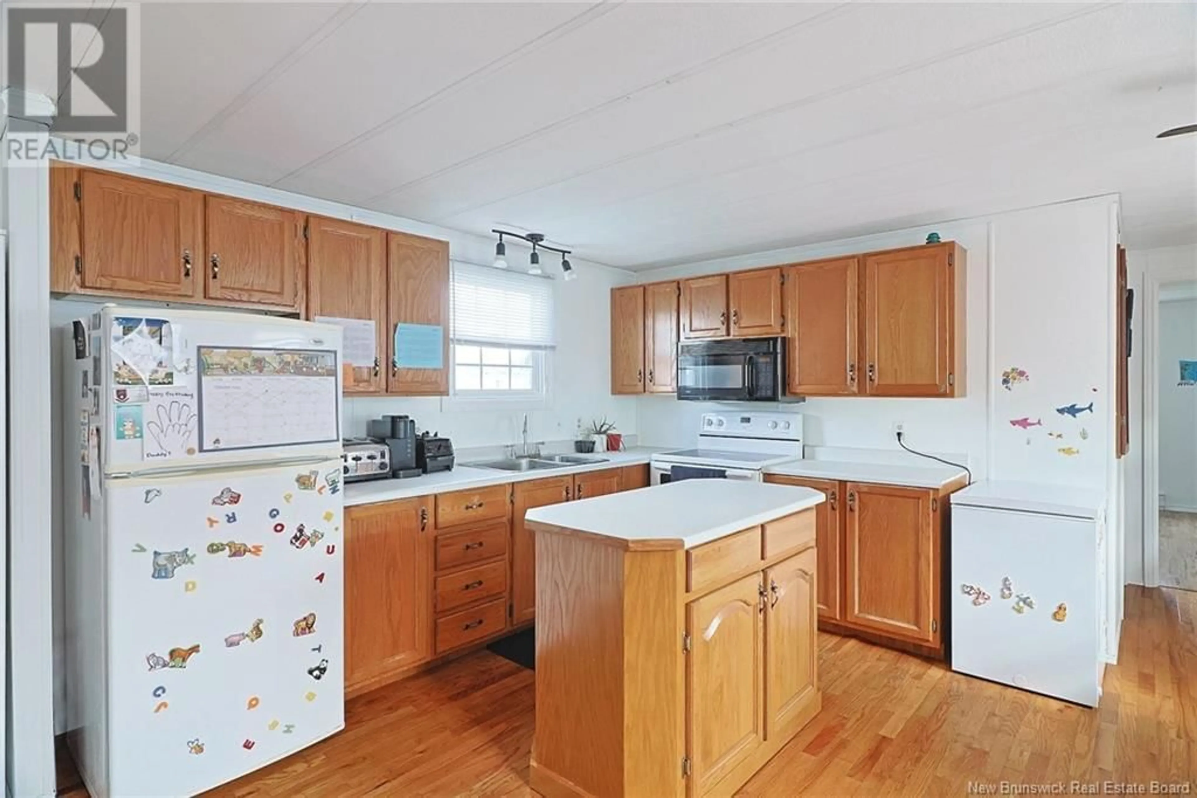 Standard kitchen, wood floors, cottage for 23 Tyler Street, Lincoln New Brunswick E3B6X4