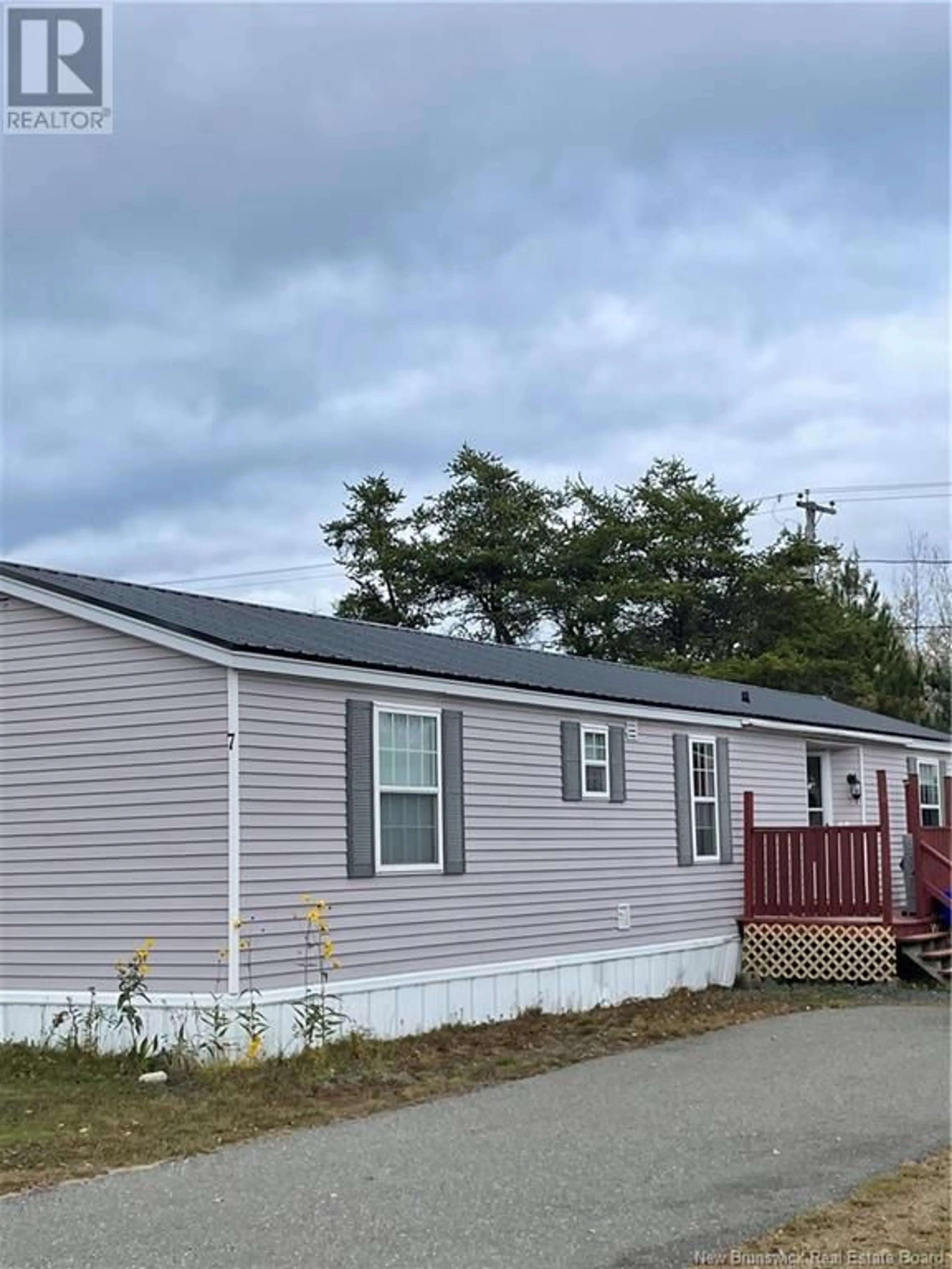 Home with vinyl exterior material for 7 Lester Drive, Pennfield New Brunswick E5H2E1