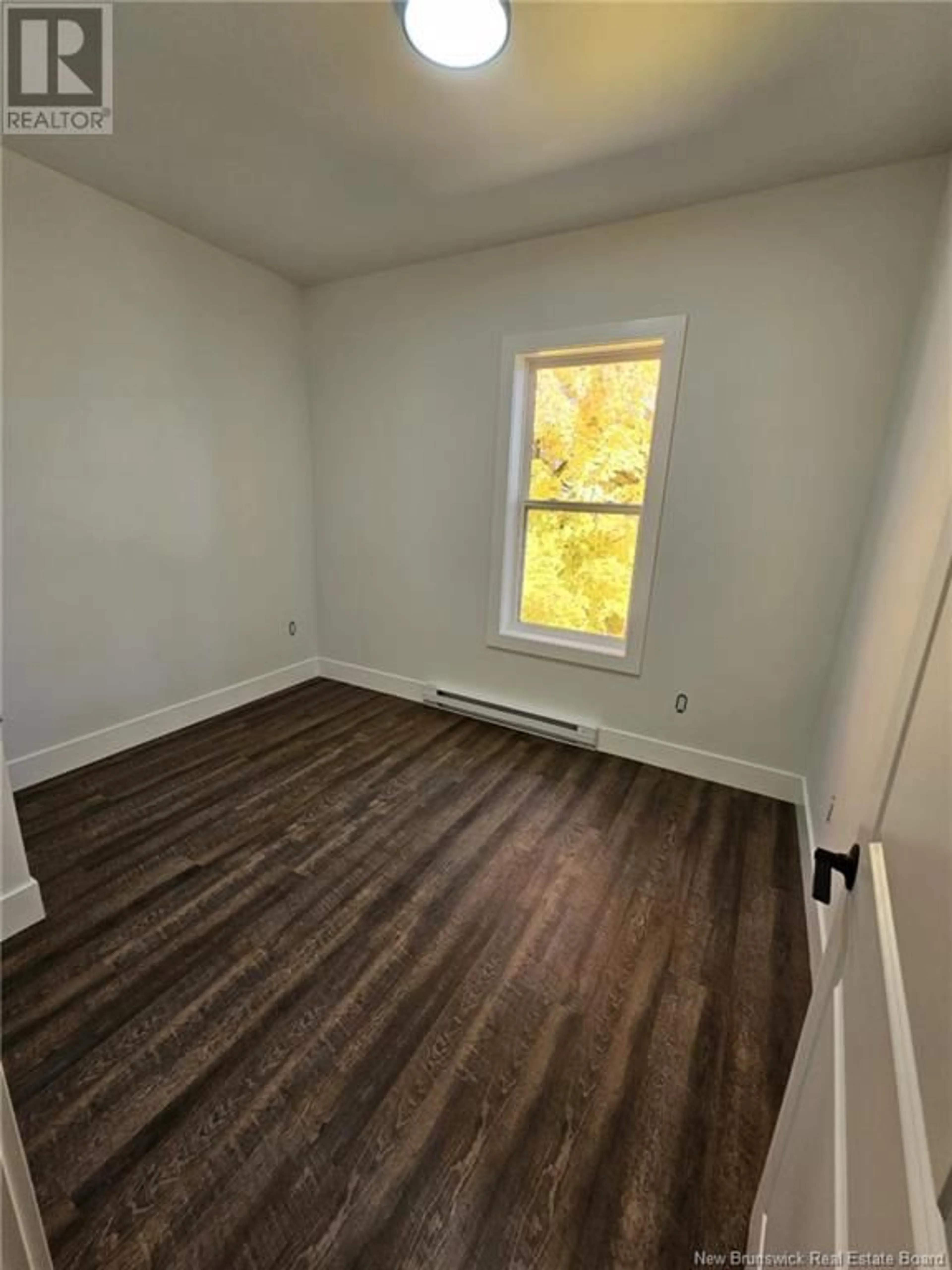 A pic of a room, wood floors for 46 Edward Street, Moncton New Brunswick E1A3Y7