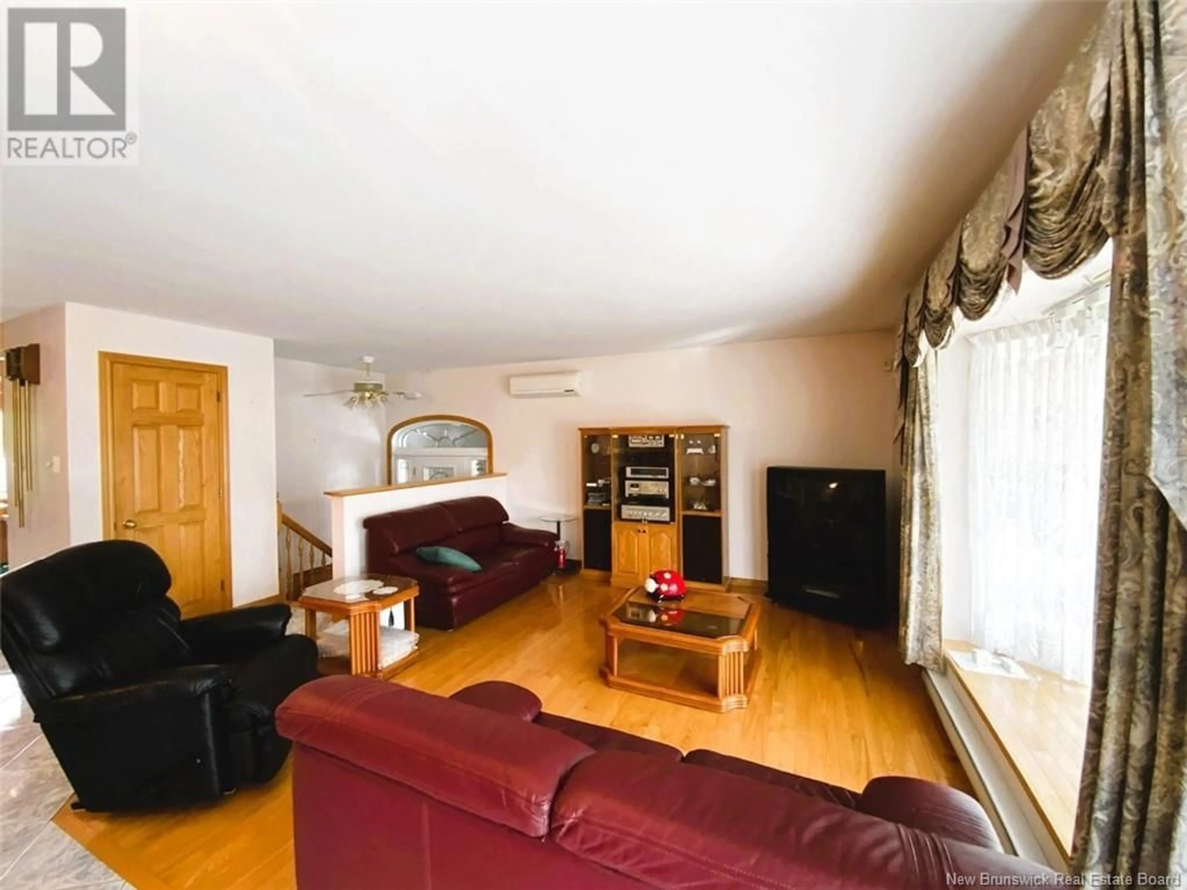 Living room, wood floors for 7 Clavette Street, Saint-Jacques New Brunswick E7B1C3