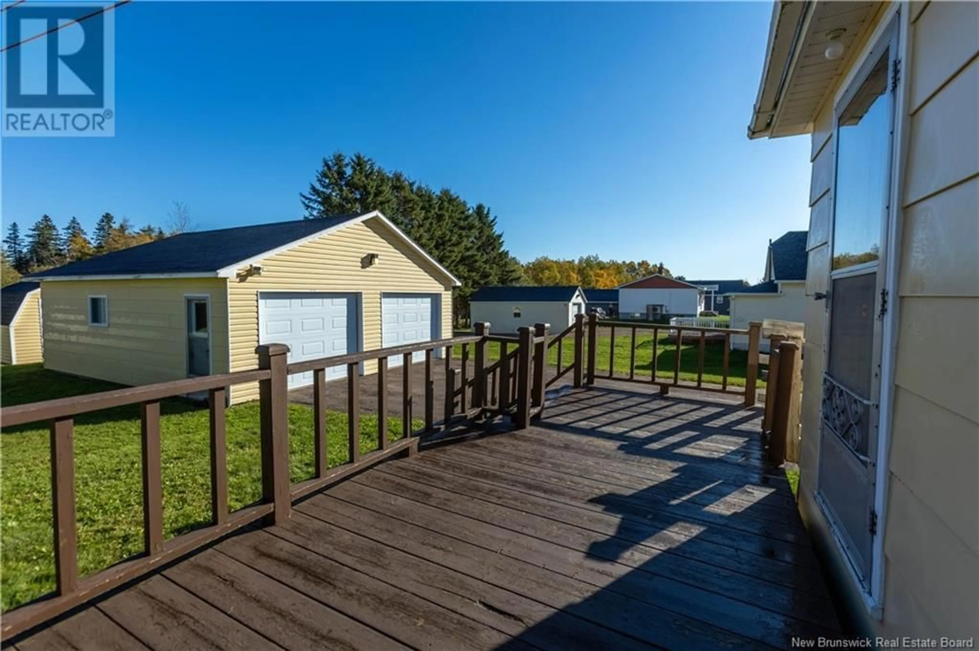 Frontside or backside of a home, the fenced backyard for 135 Charlotte Street, Sackville New Brunswick E4L2Y6